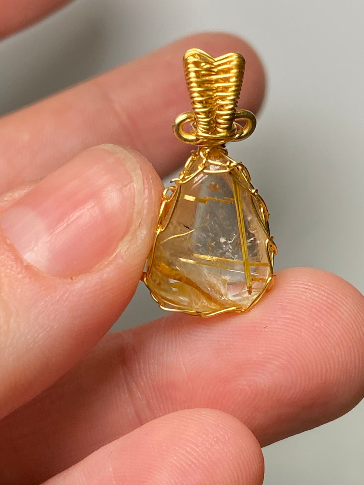 Golden rutile crystal wire wrapped pendant