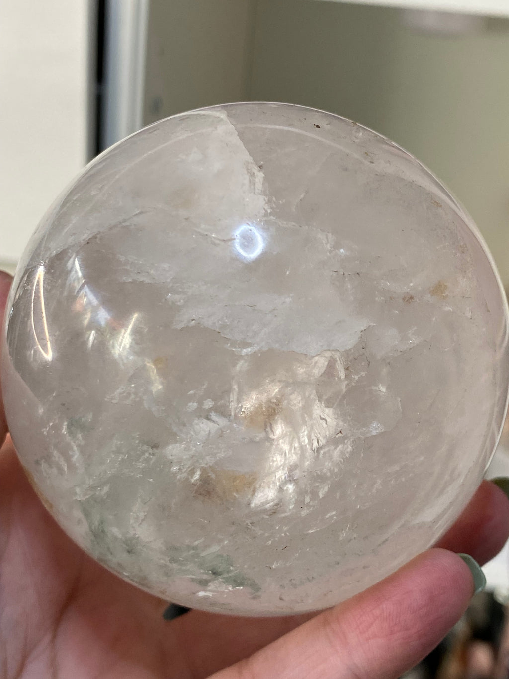Large clear quartz crystal sphere with Garden