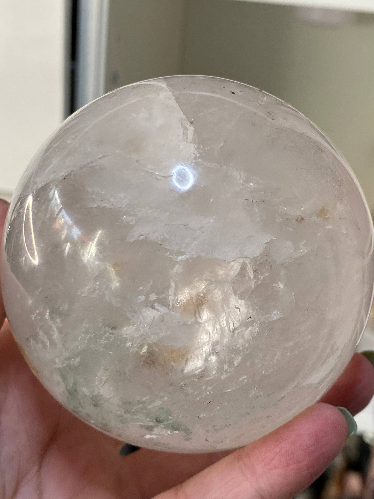 Large clear quartz crystal sphere with Garden