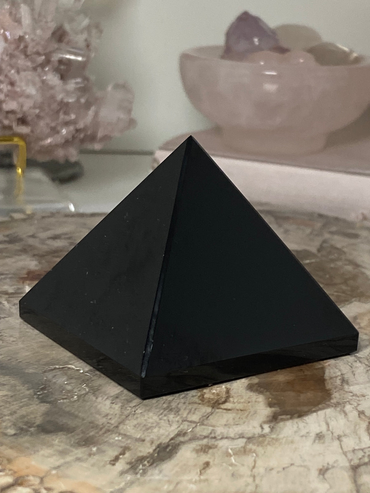 Obsidian crystal pyramid carving