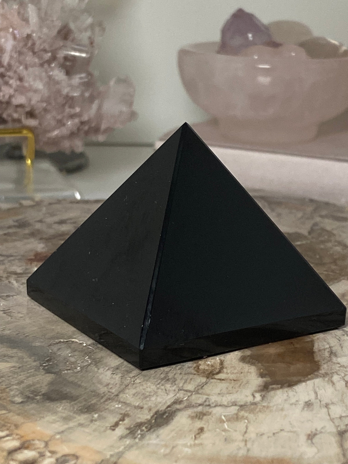 Obsidian crystal pyramid carving