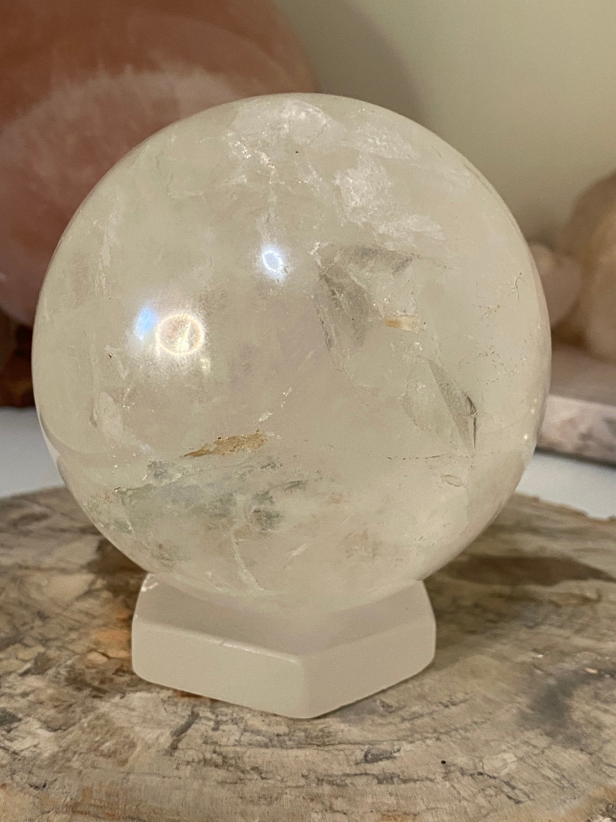 Large clear quartz crystal sphere with Garden