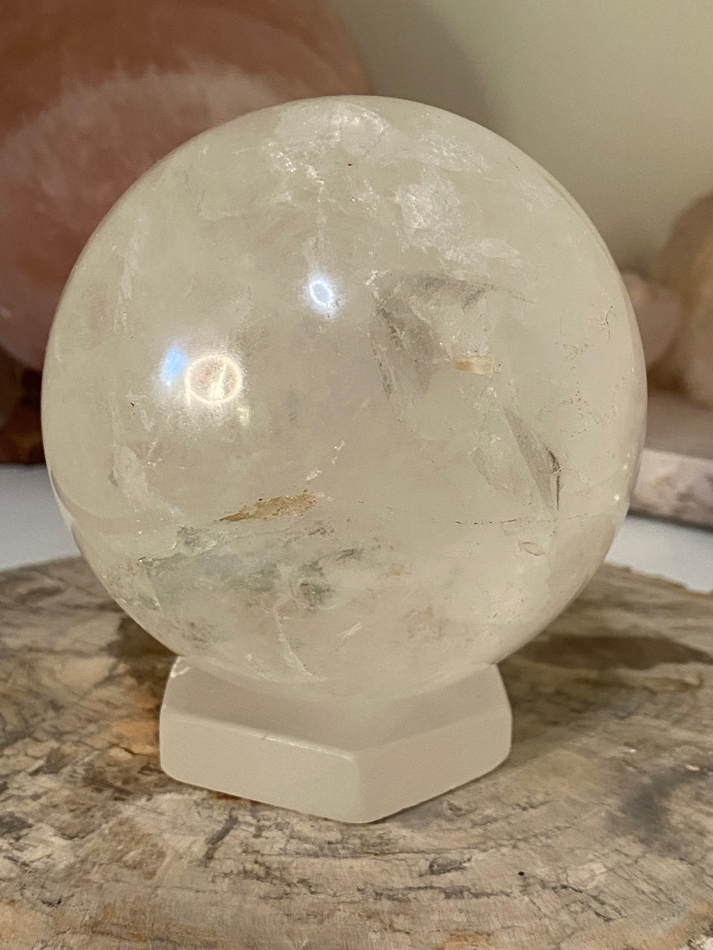 Large clear quartz crystal sphere with Garden