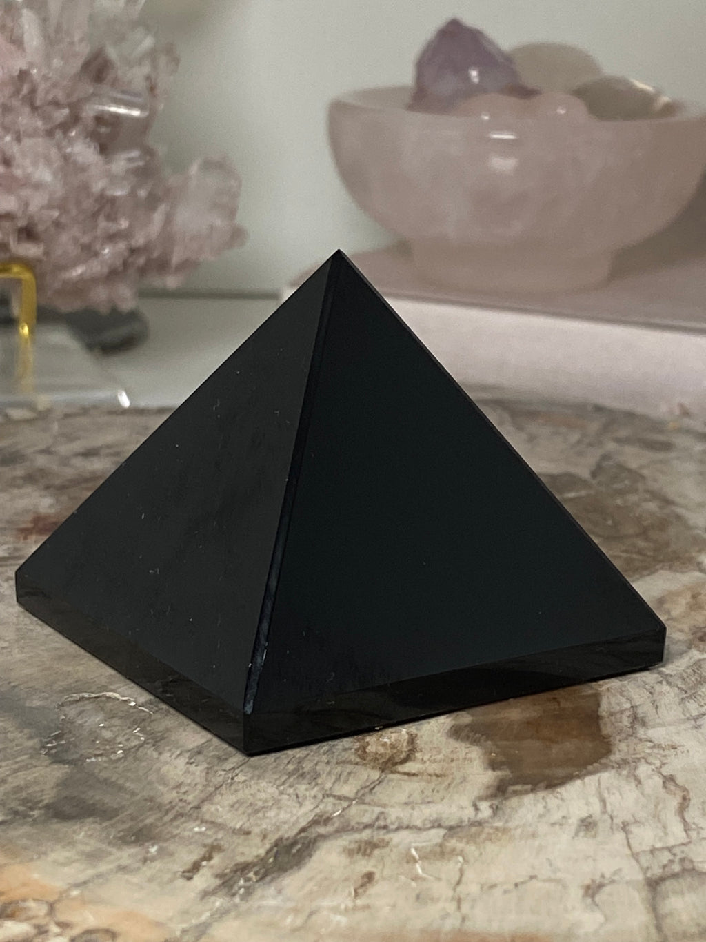 Obsidian crystal pyramid carving