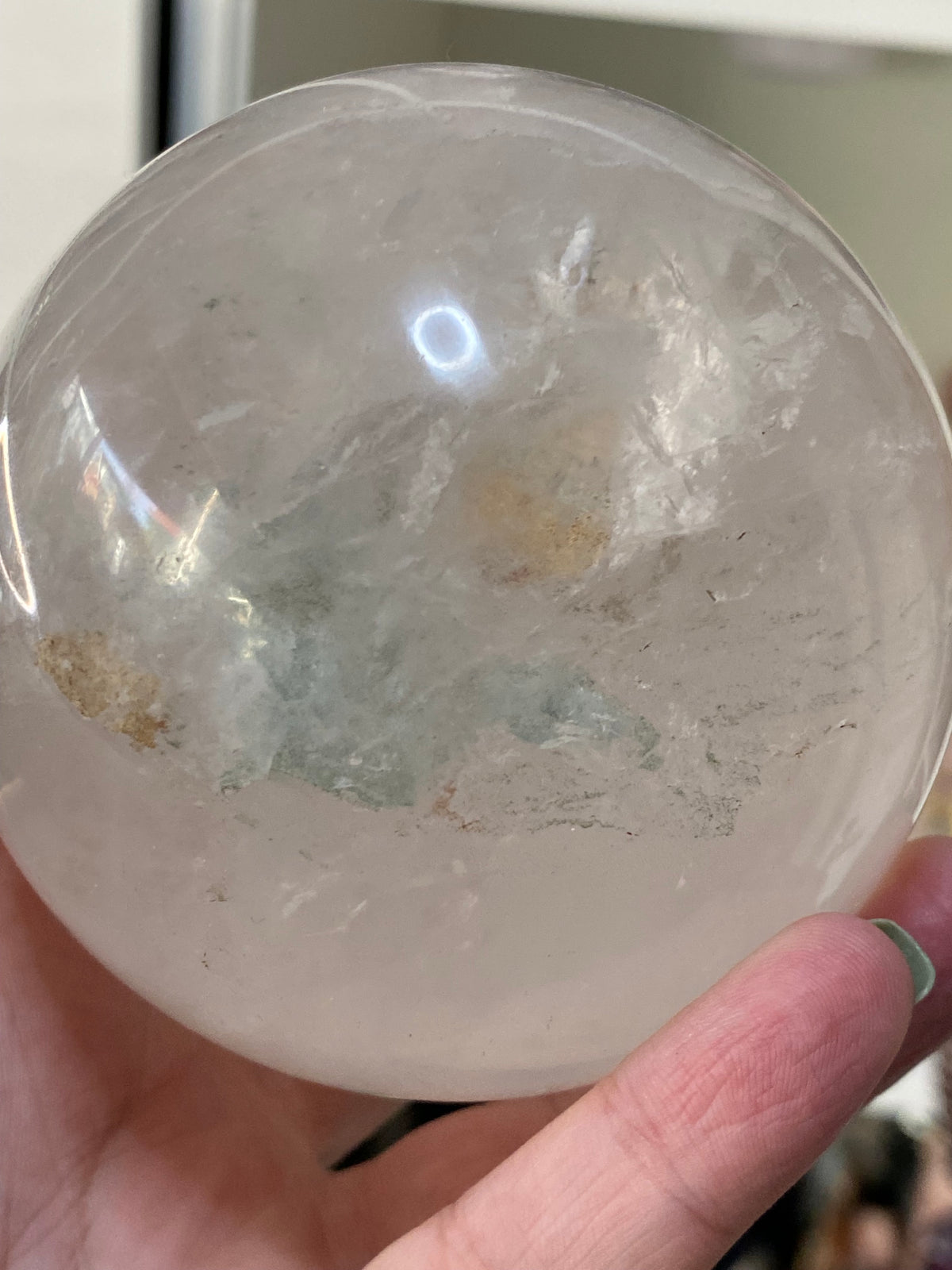 Large clear quartz crystal sphere with Garden