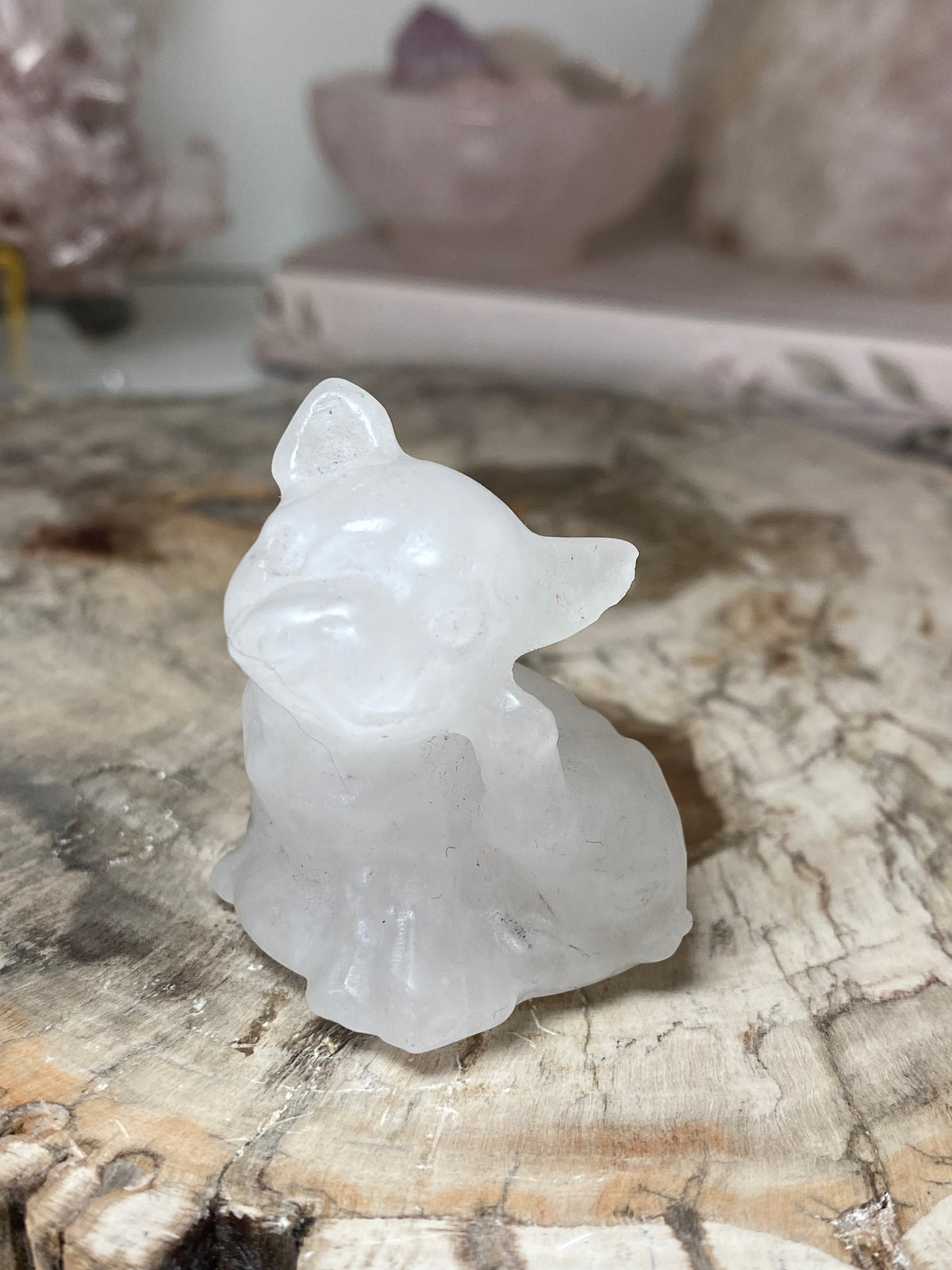 Small clear quartz crystal dog carving