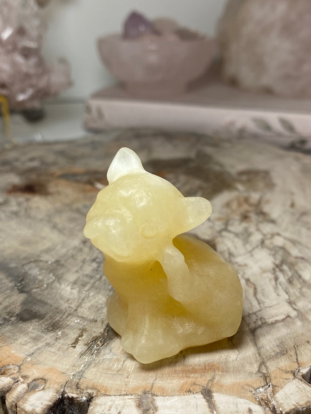 Small clear quartz crystal dog carving