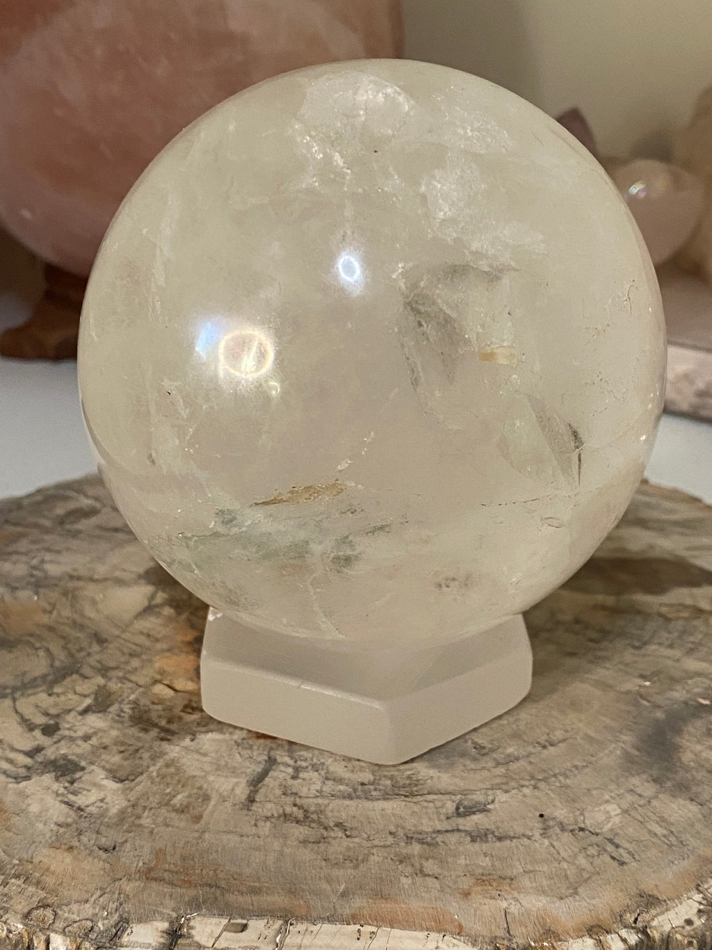 Large clear quartz crystal sphere with Garden