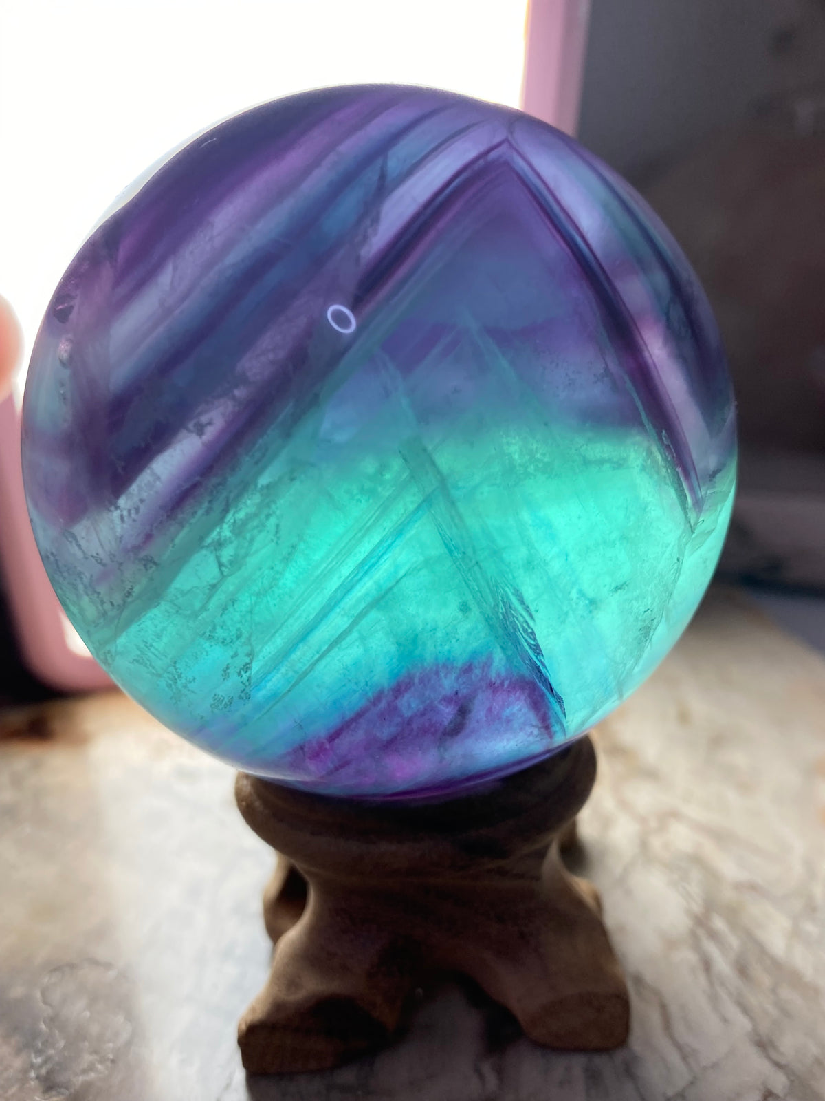 Rainbow fluorite crystal sphere