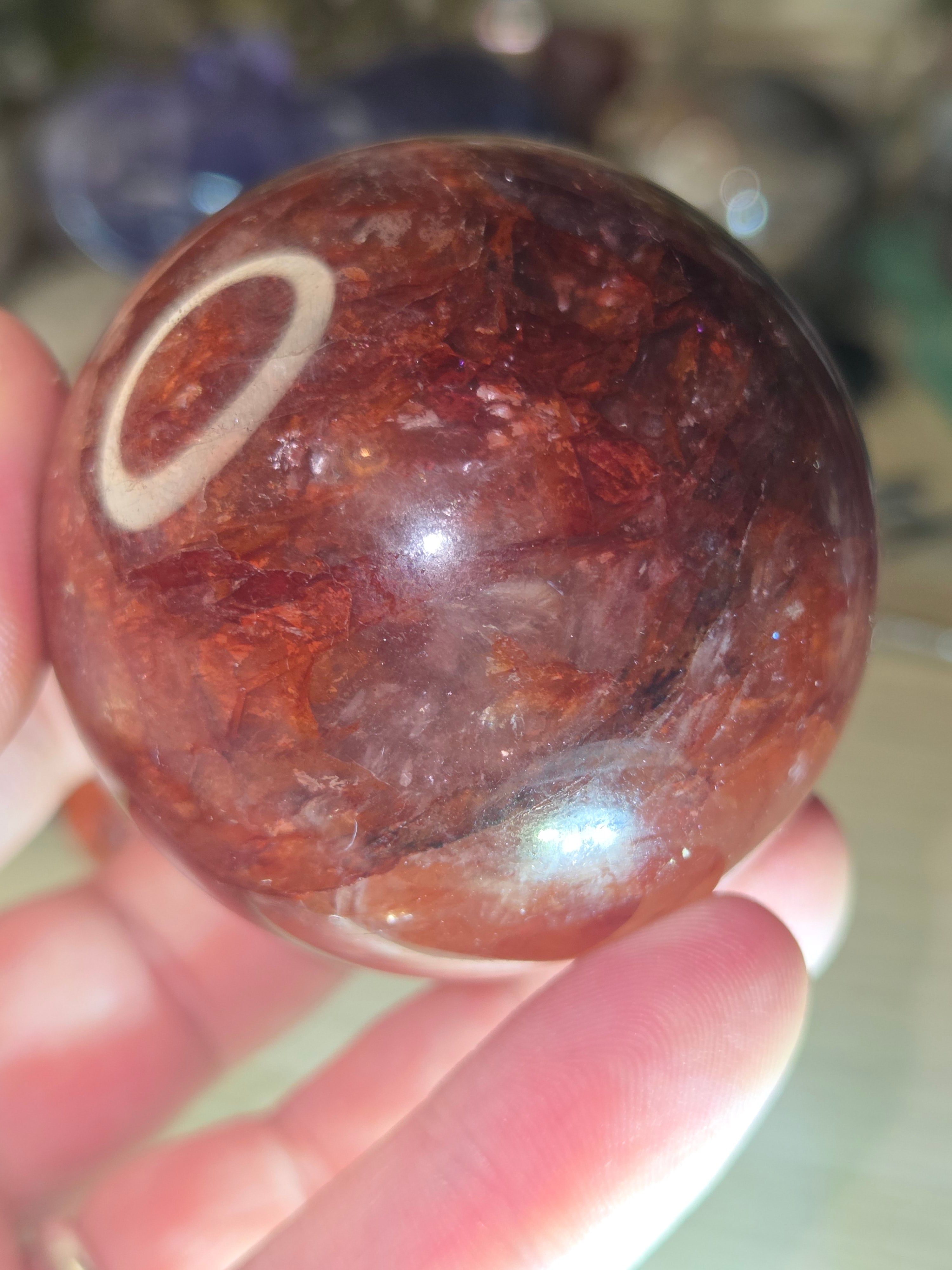 Fire quartz crystal sphere