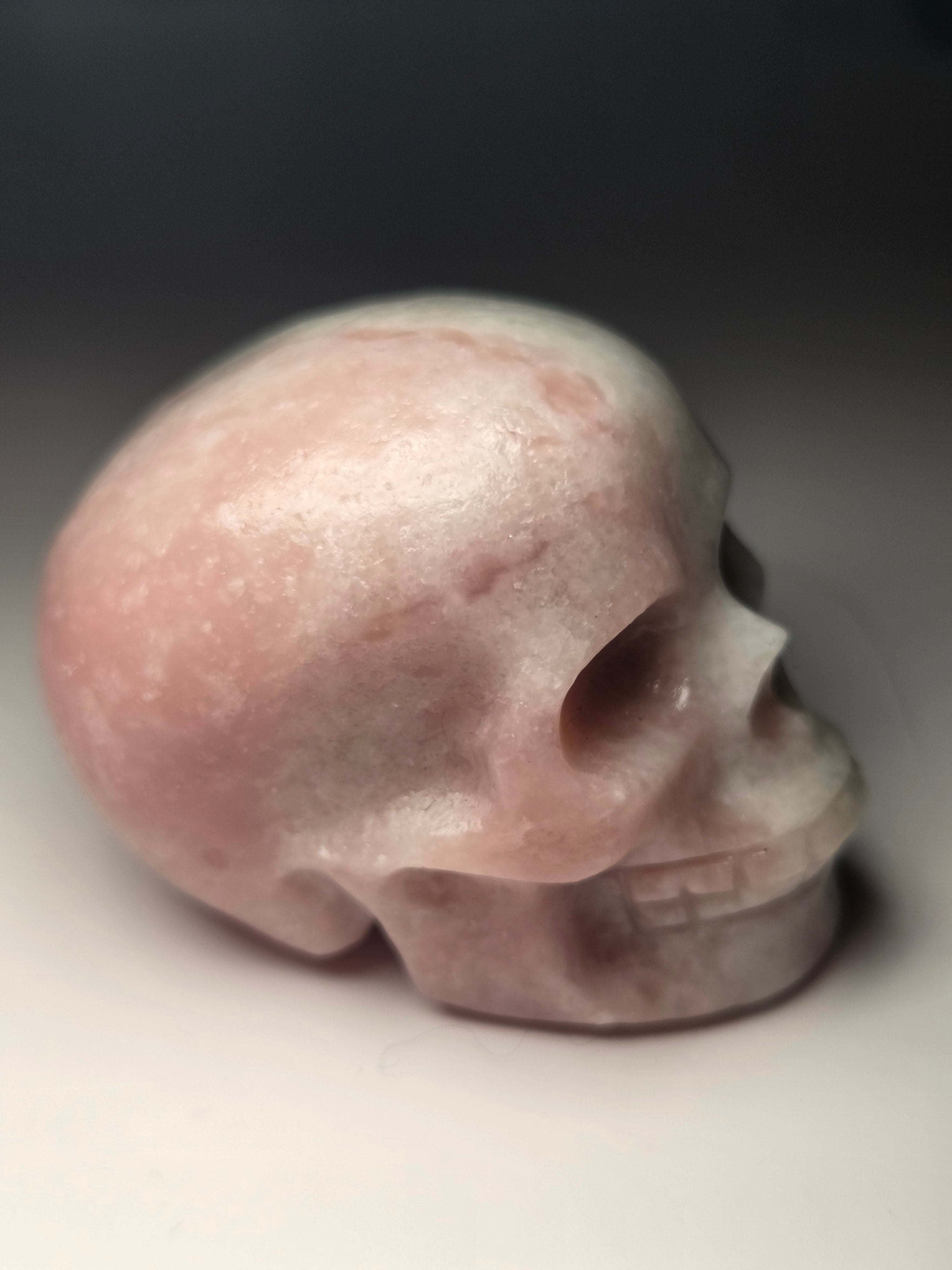 Pink opal  crystal skull carving