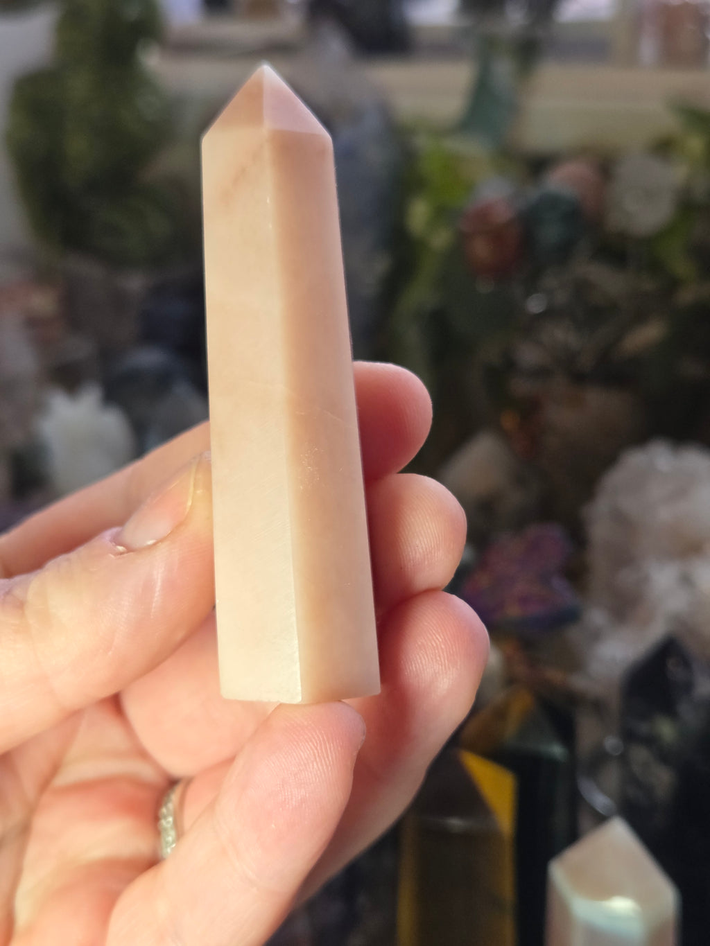 Pink opal crystal tower carving