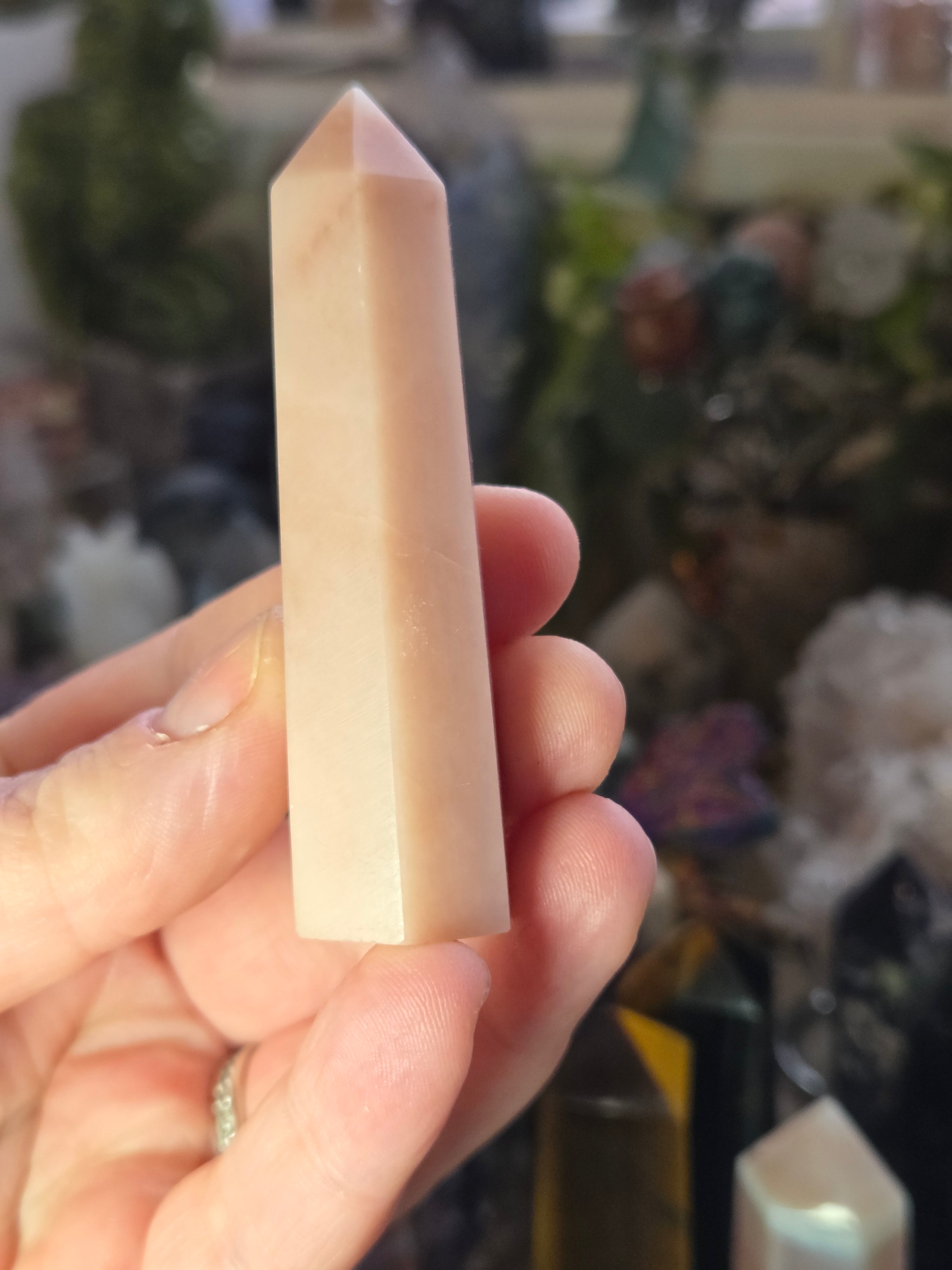 Pink opal crystal tower carving