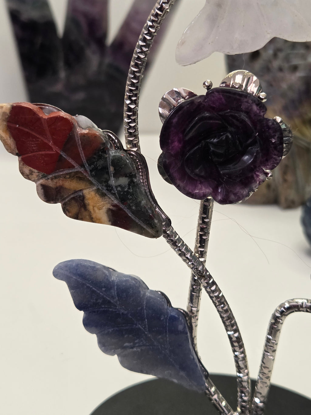 Flower and butterfly sphere stand