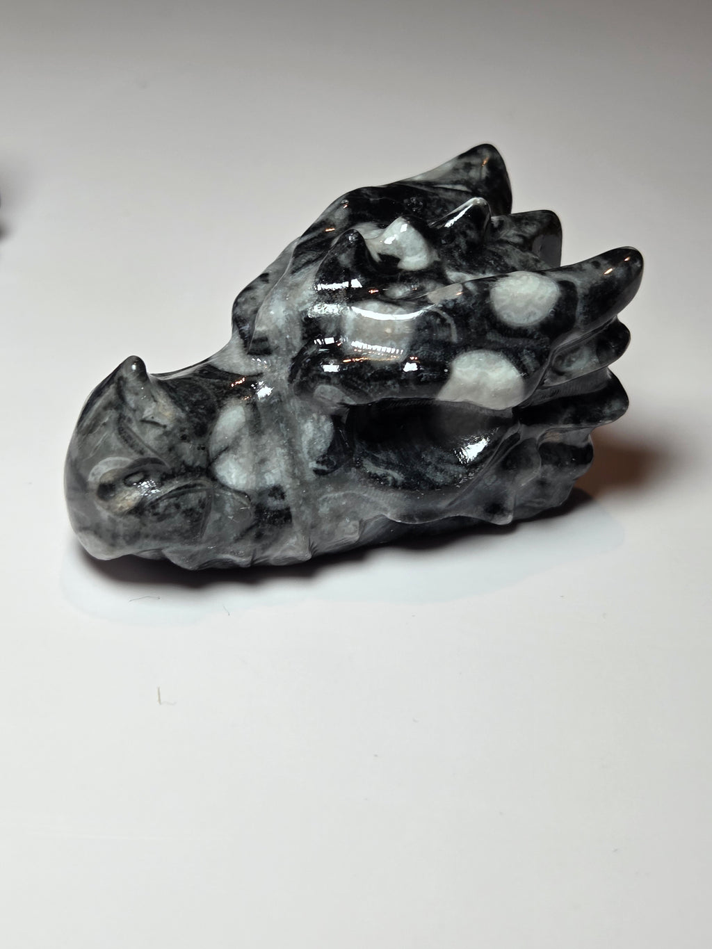 Fossil stone crystal dragon head carving