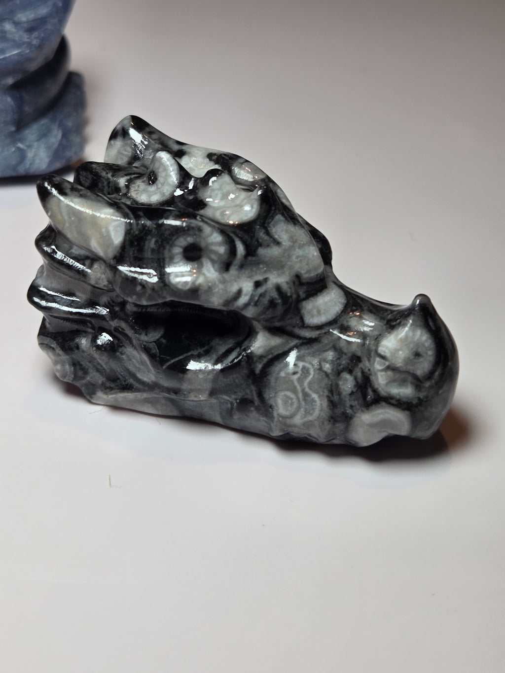 Fossil stone crystal dragon head carving