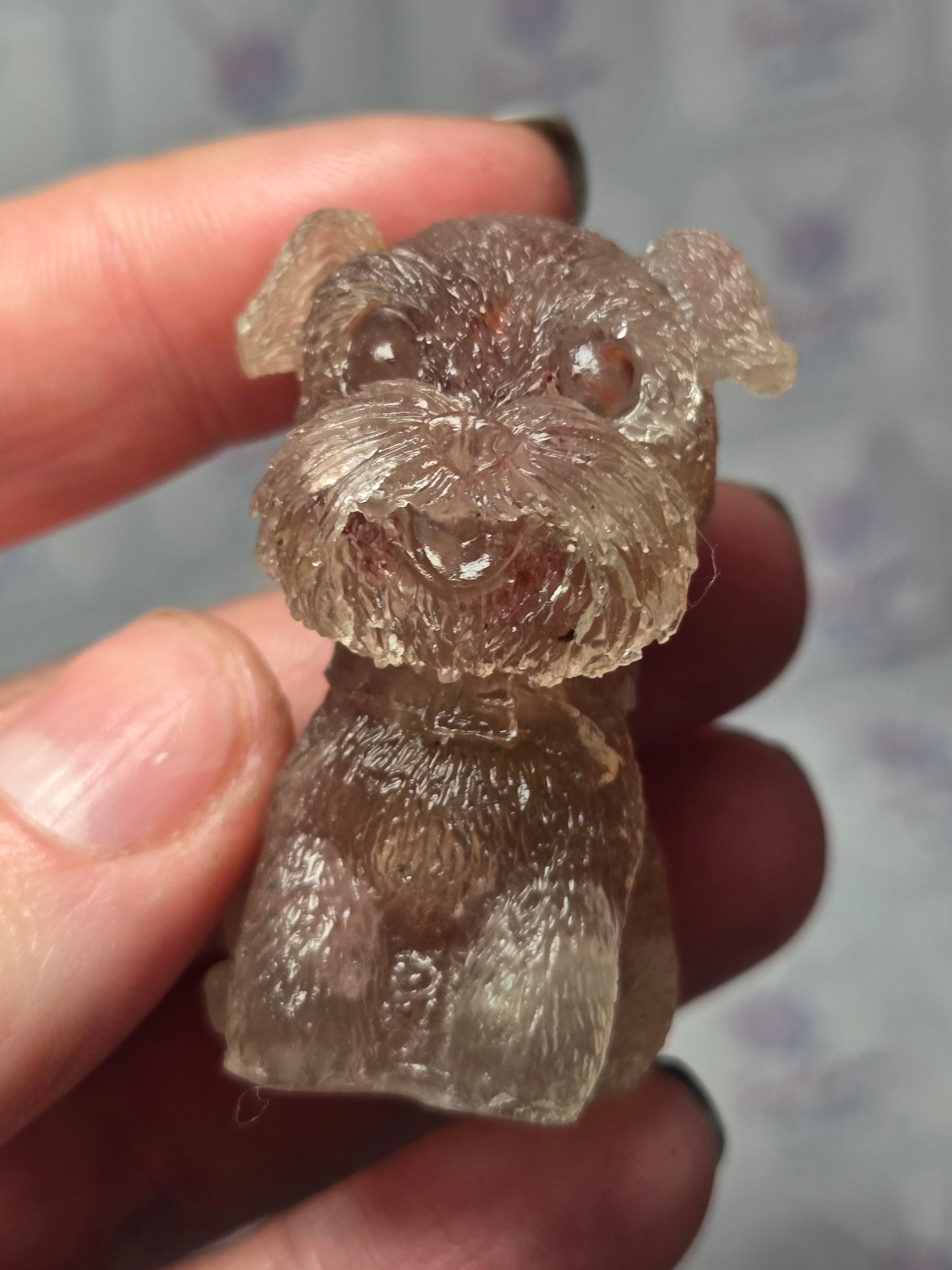 Strawberry quartz crystal shnowzer carving in resin