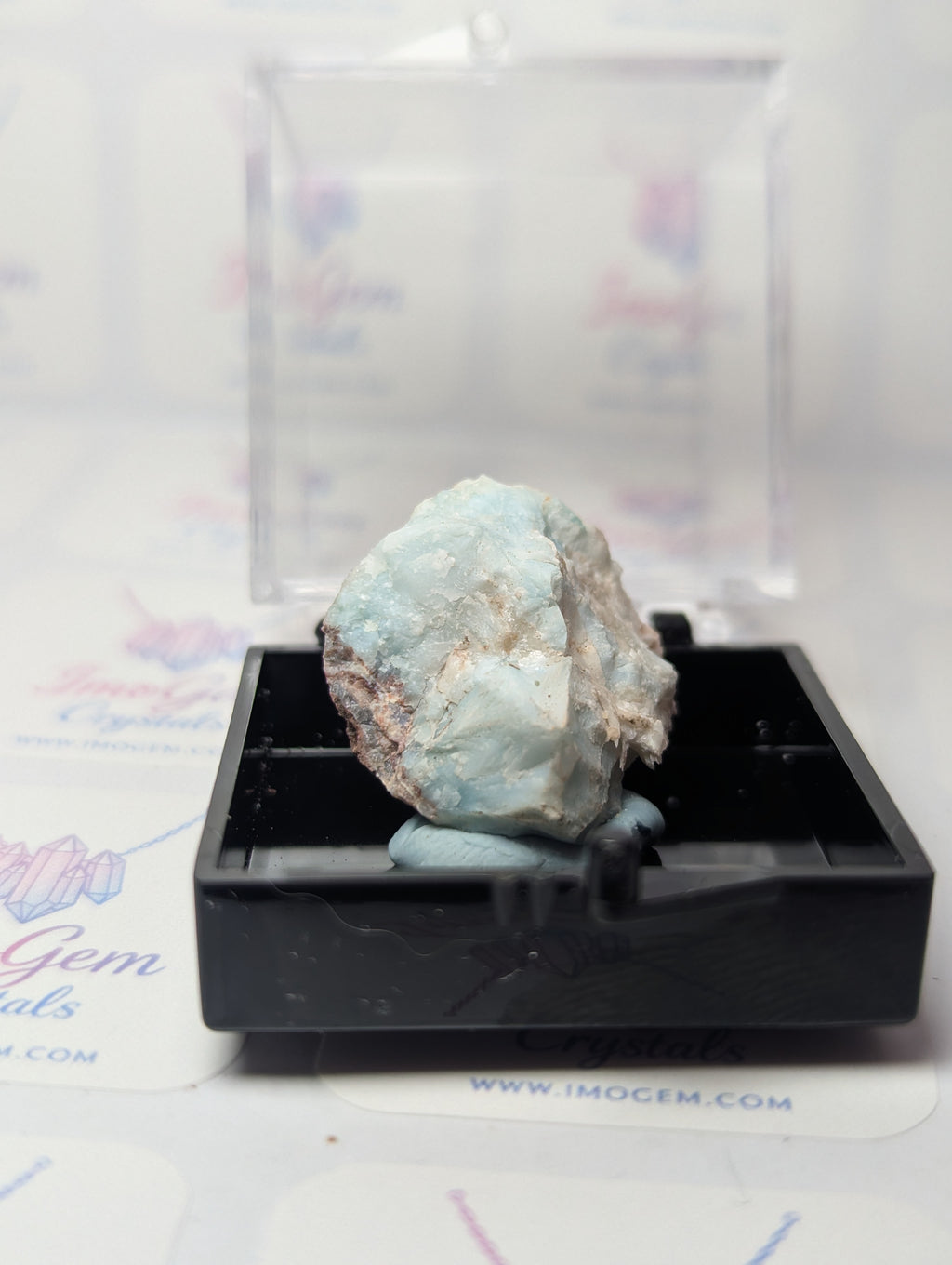 Raw Larimar crystal specimen with box