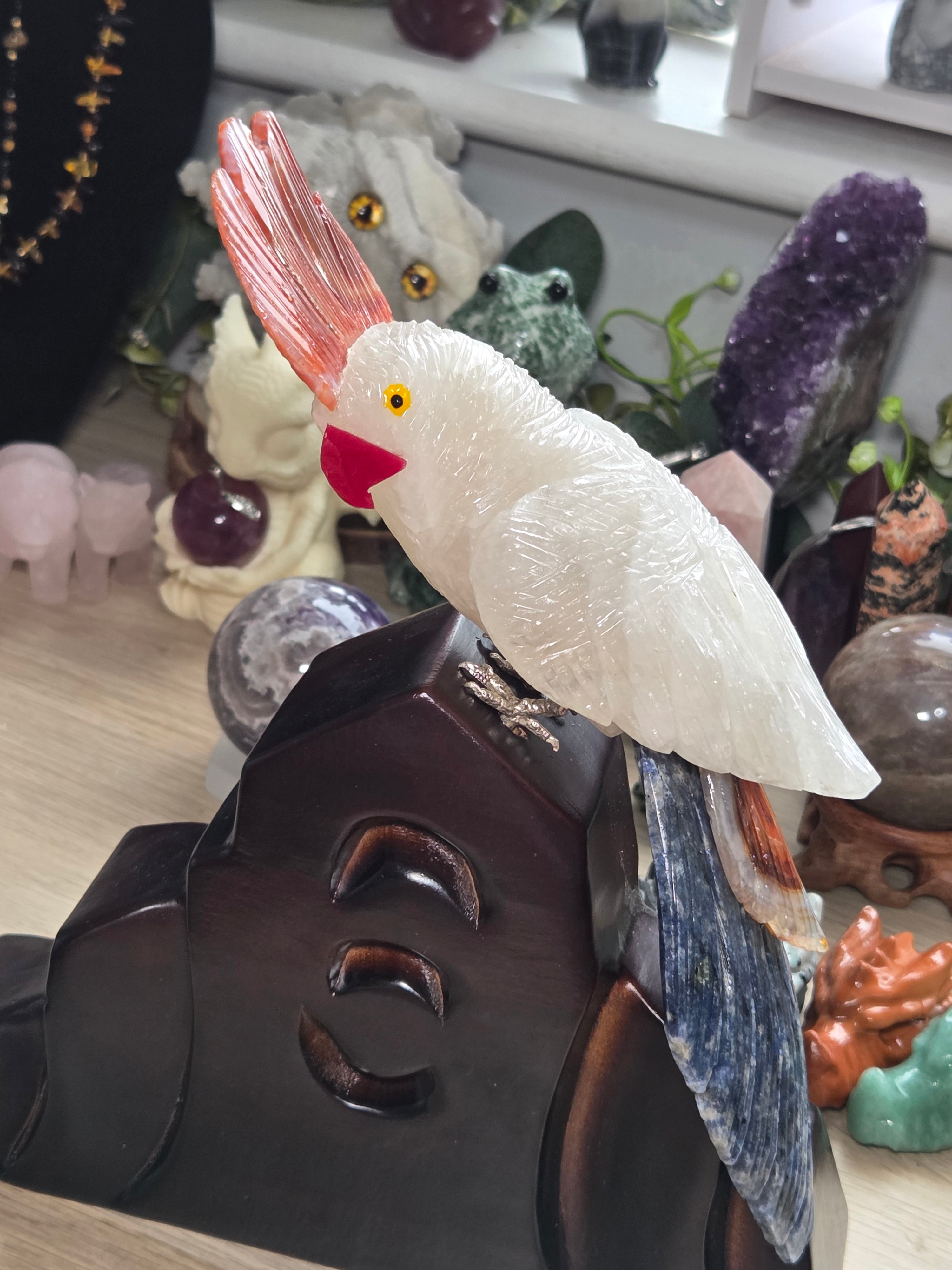Amazing clear quartz crystal parrot with red agate and sodalite with custom stand