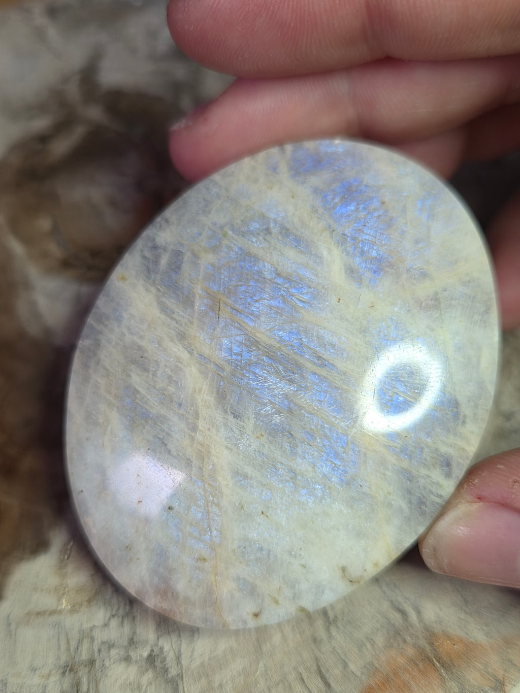 Beautiful crystal moonstone palm stone
