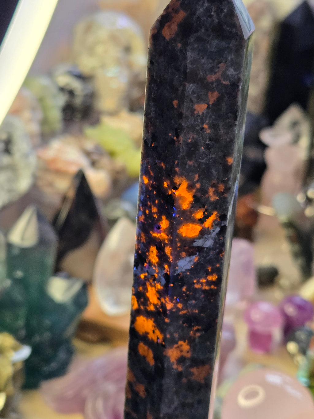 Large Yooperlite crystal tower with orange Uv