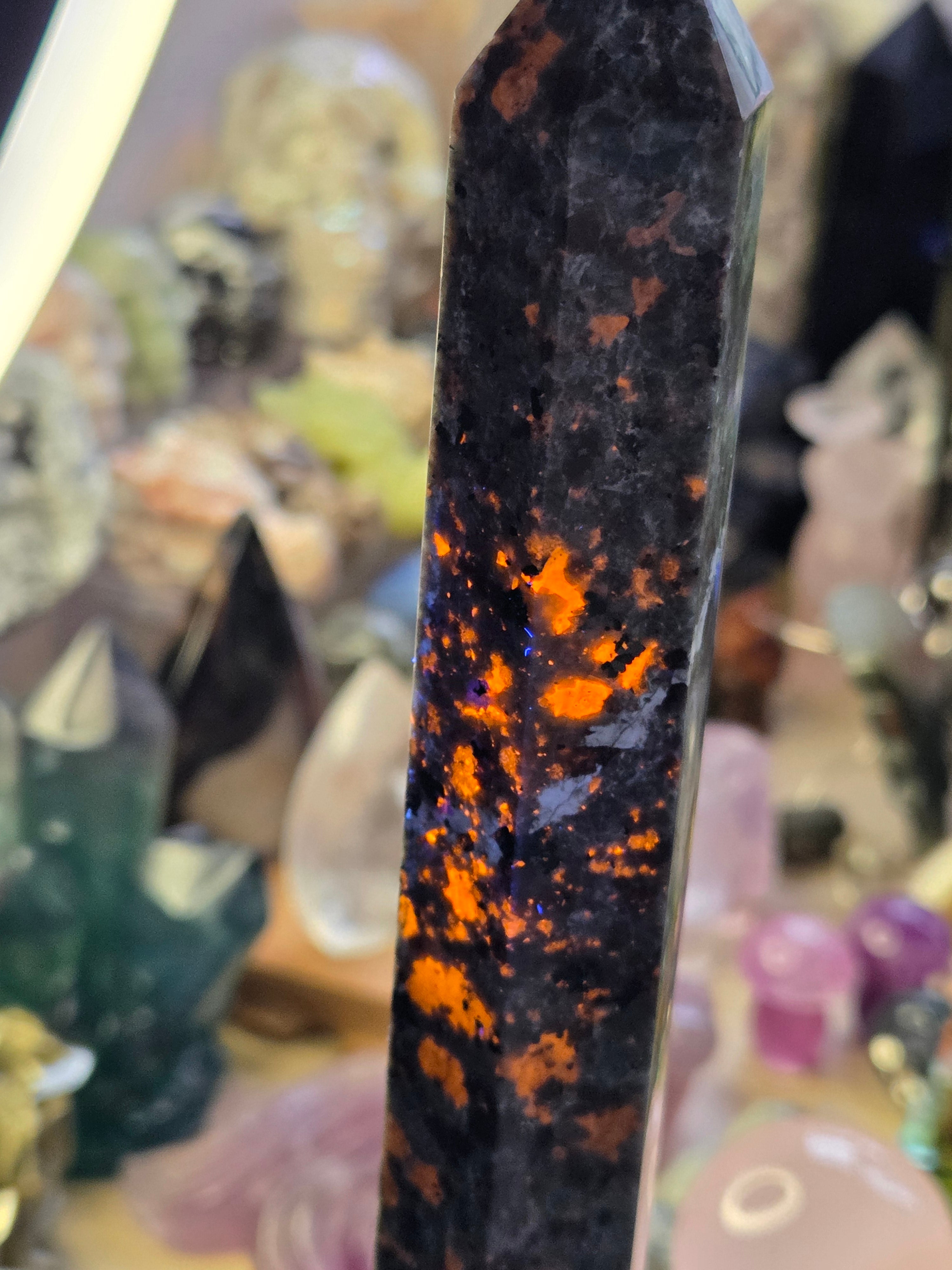 Large Yooperlite crystal tower with orange Uv