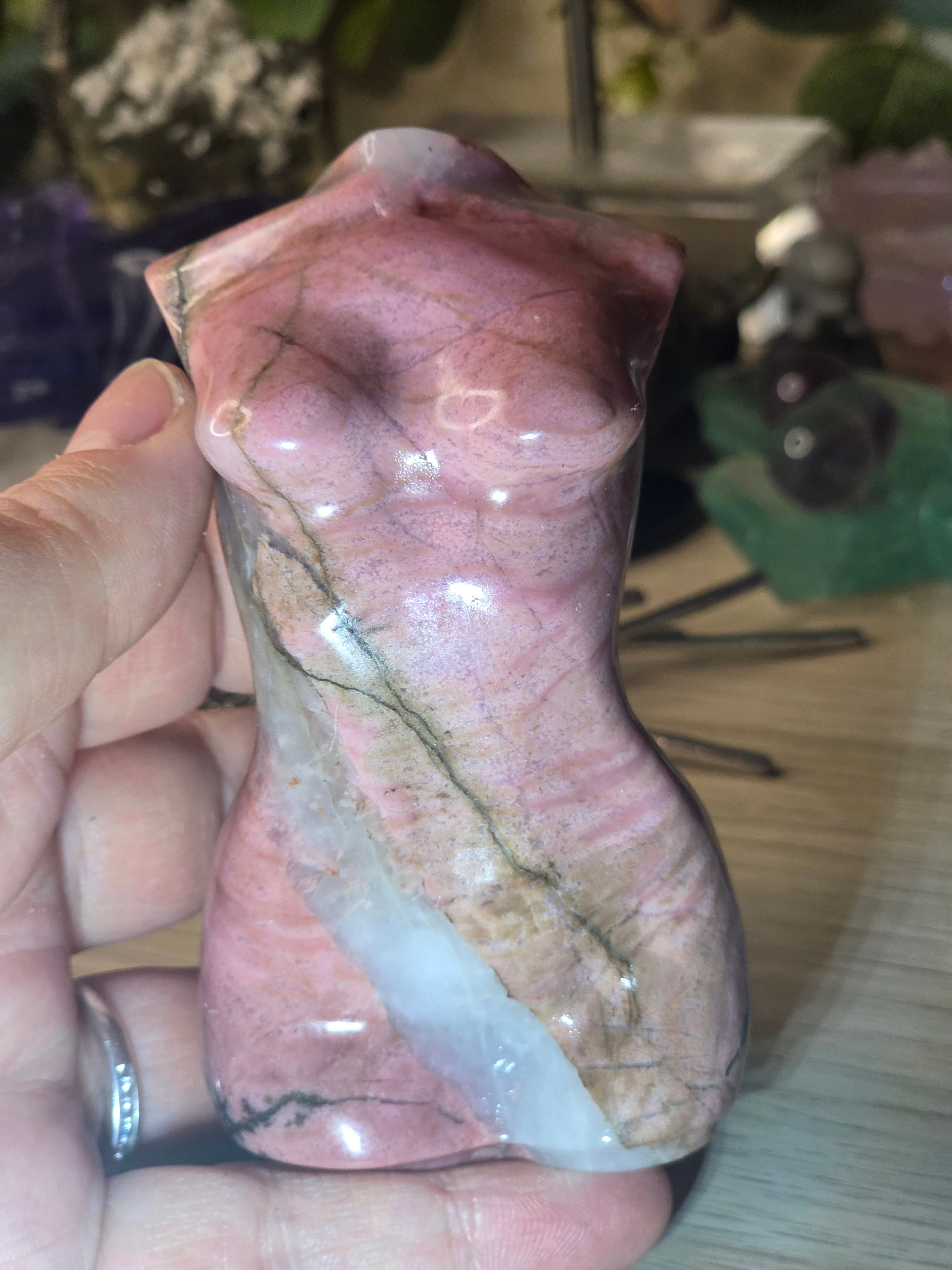 Rhodonite crystal female body carving