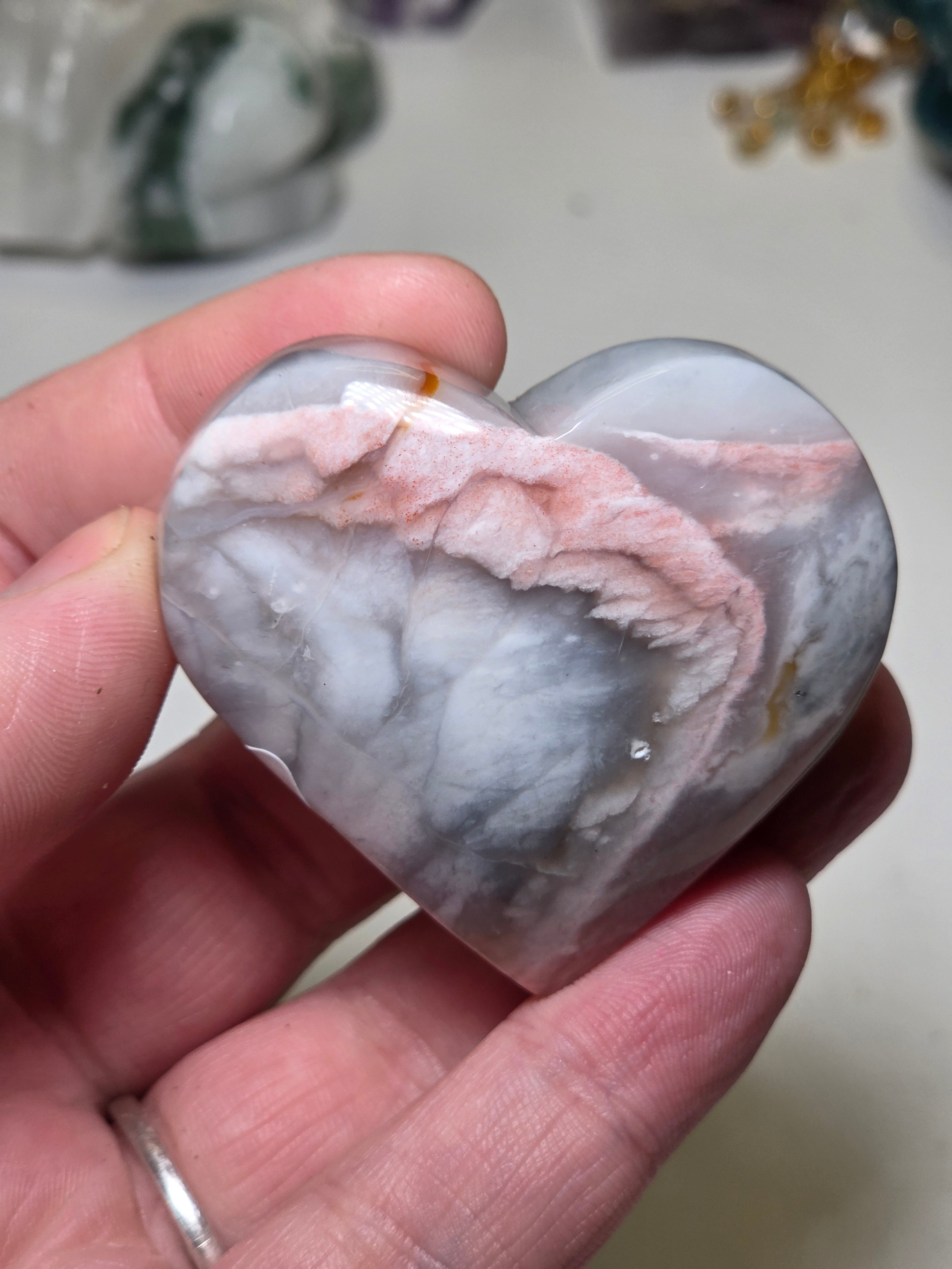 Pink petrified wood crystal heart carving