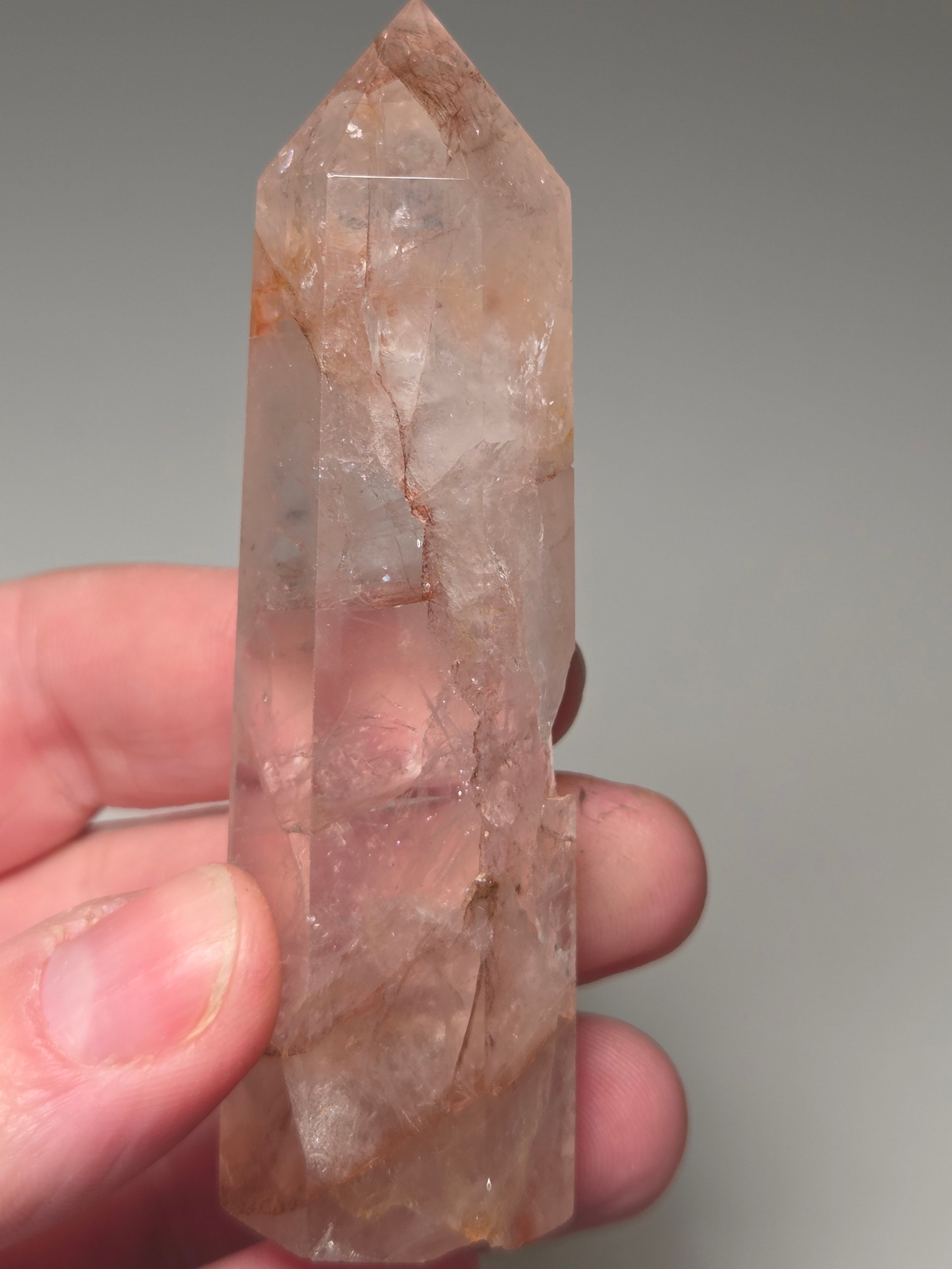 Fire quartz crystal tower with imperfections