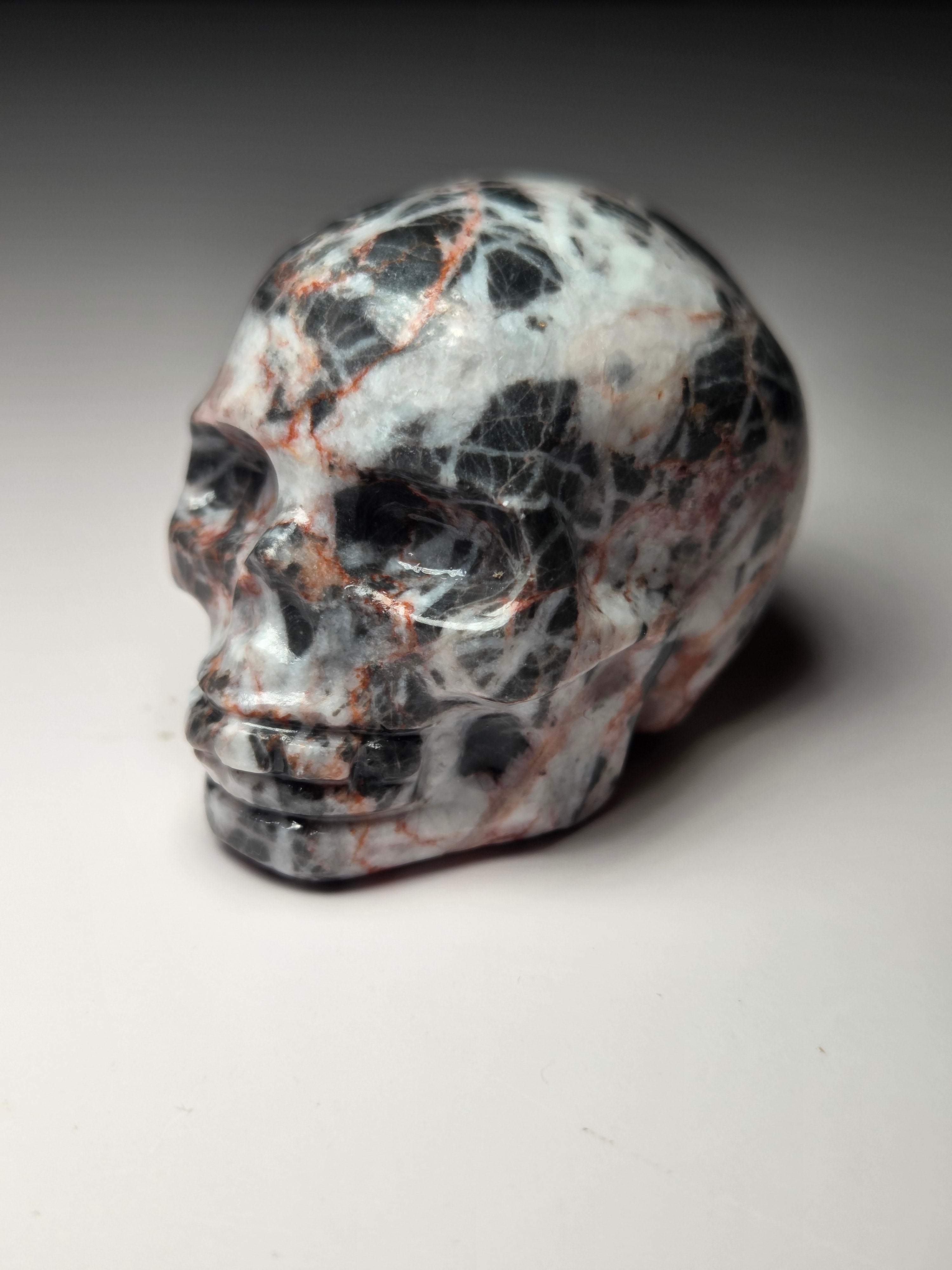 Red vain jasper crystal skull