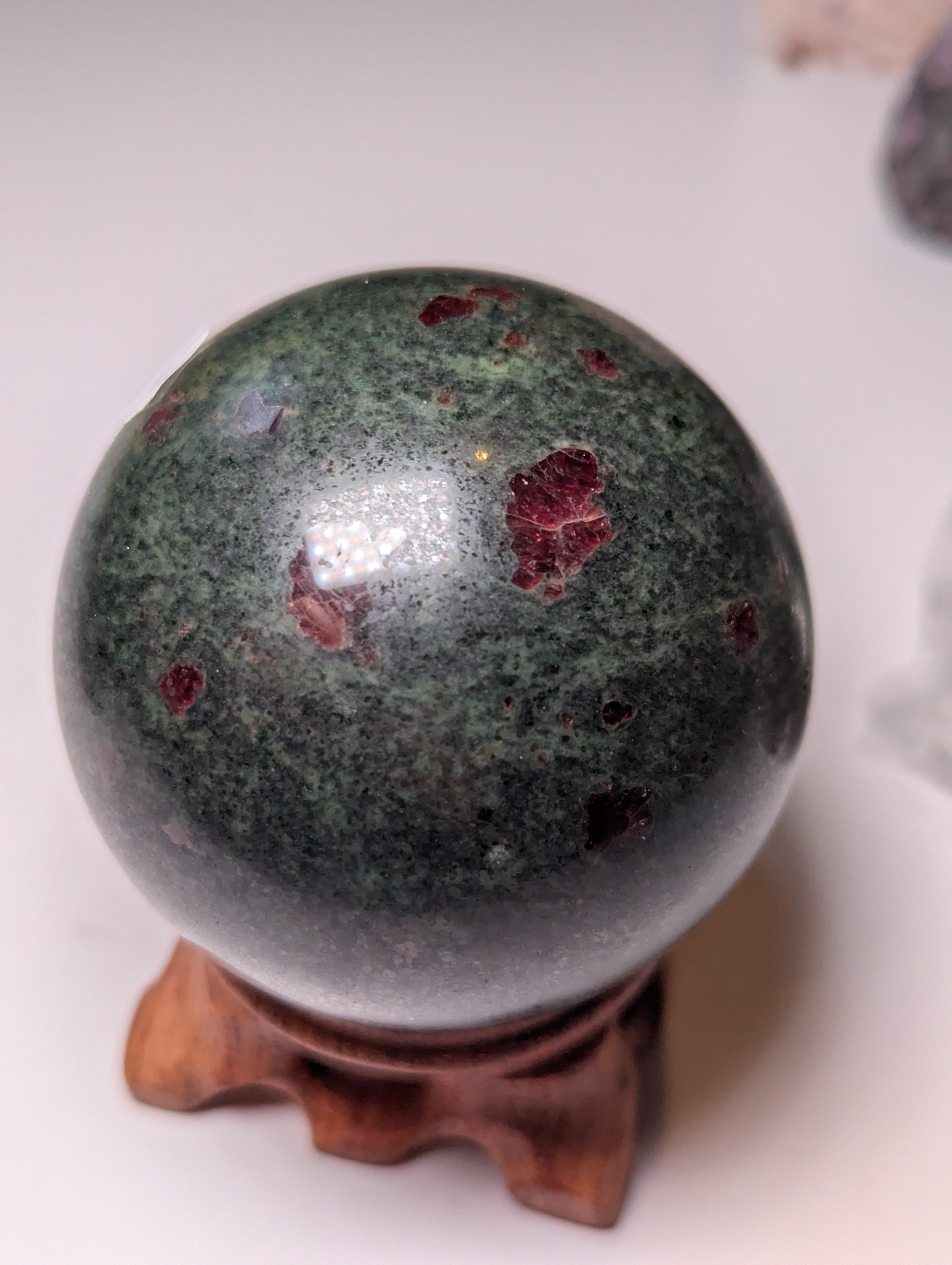 Garnet in frushite crystal sphere