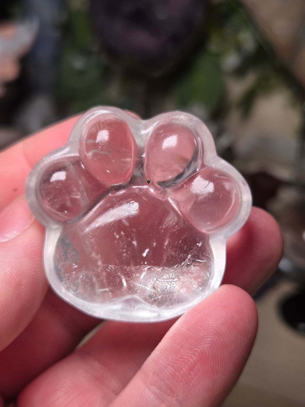 Clear quartz crystal paw print carving