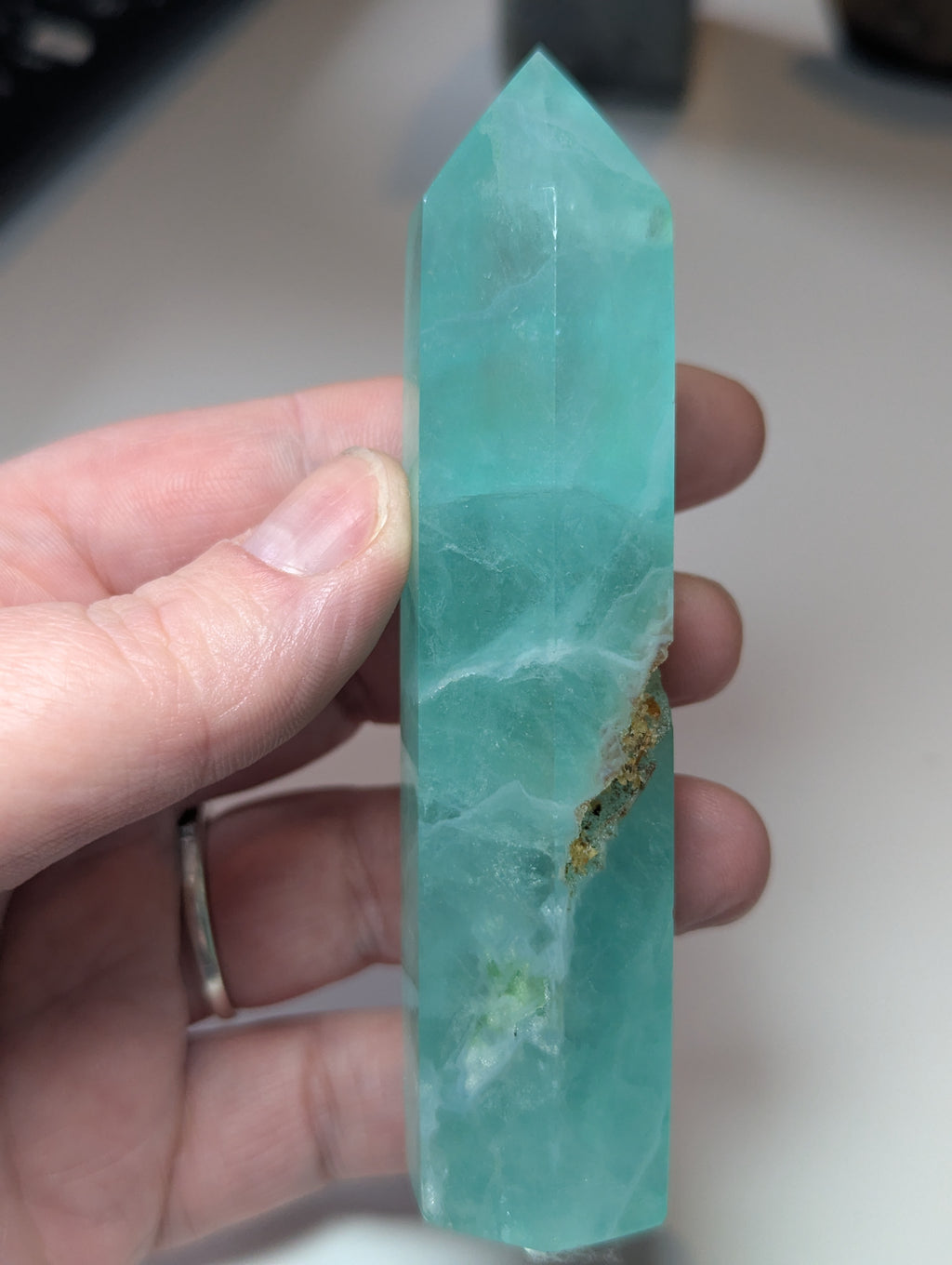 Green flouite crystal tower with imperfections