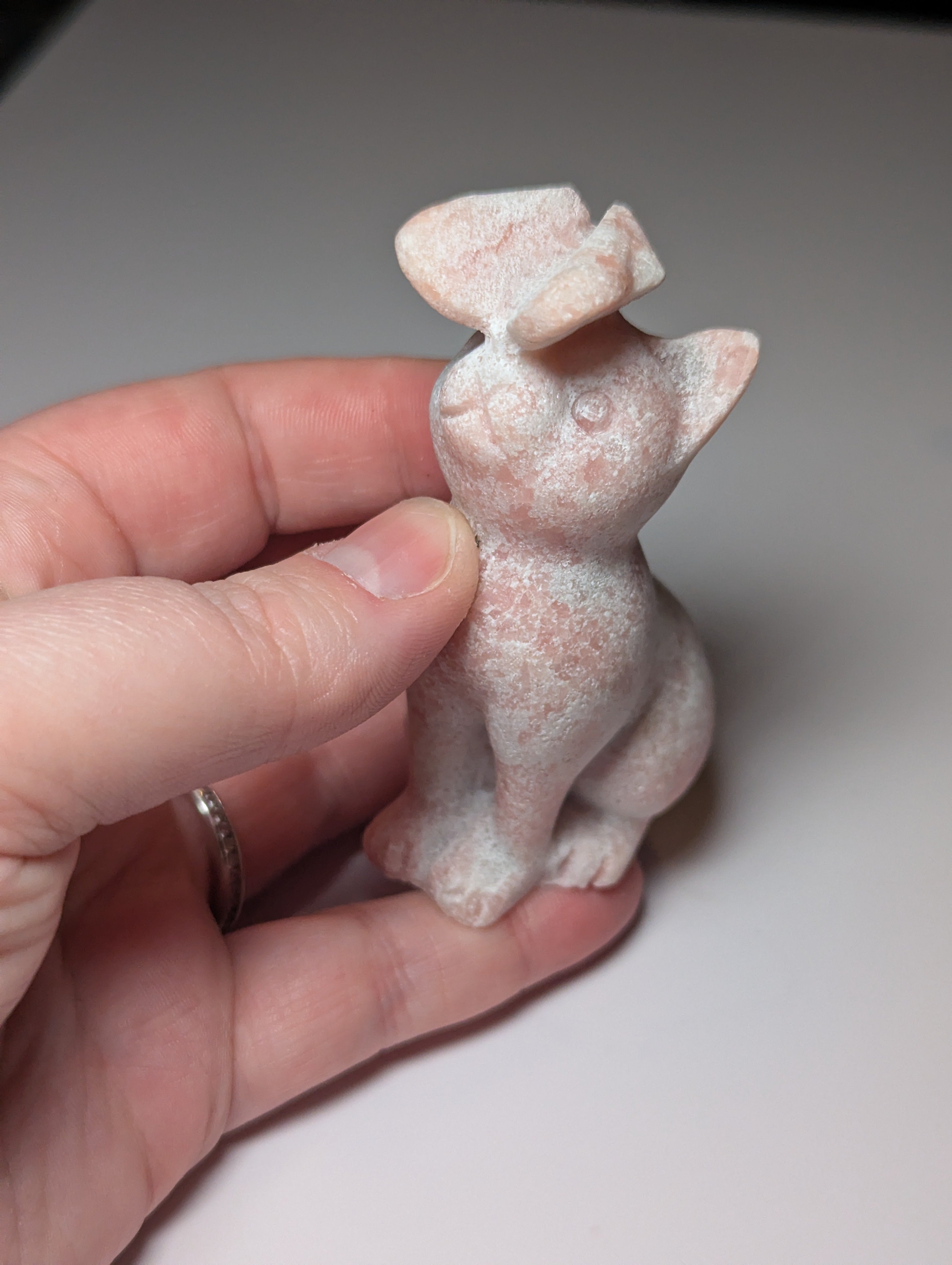 Pink opal cat with butterfly carving