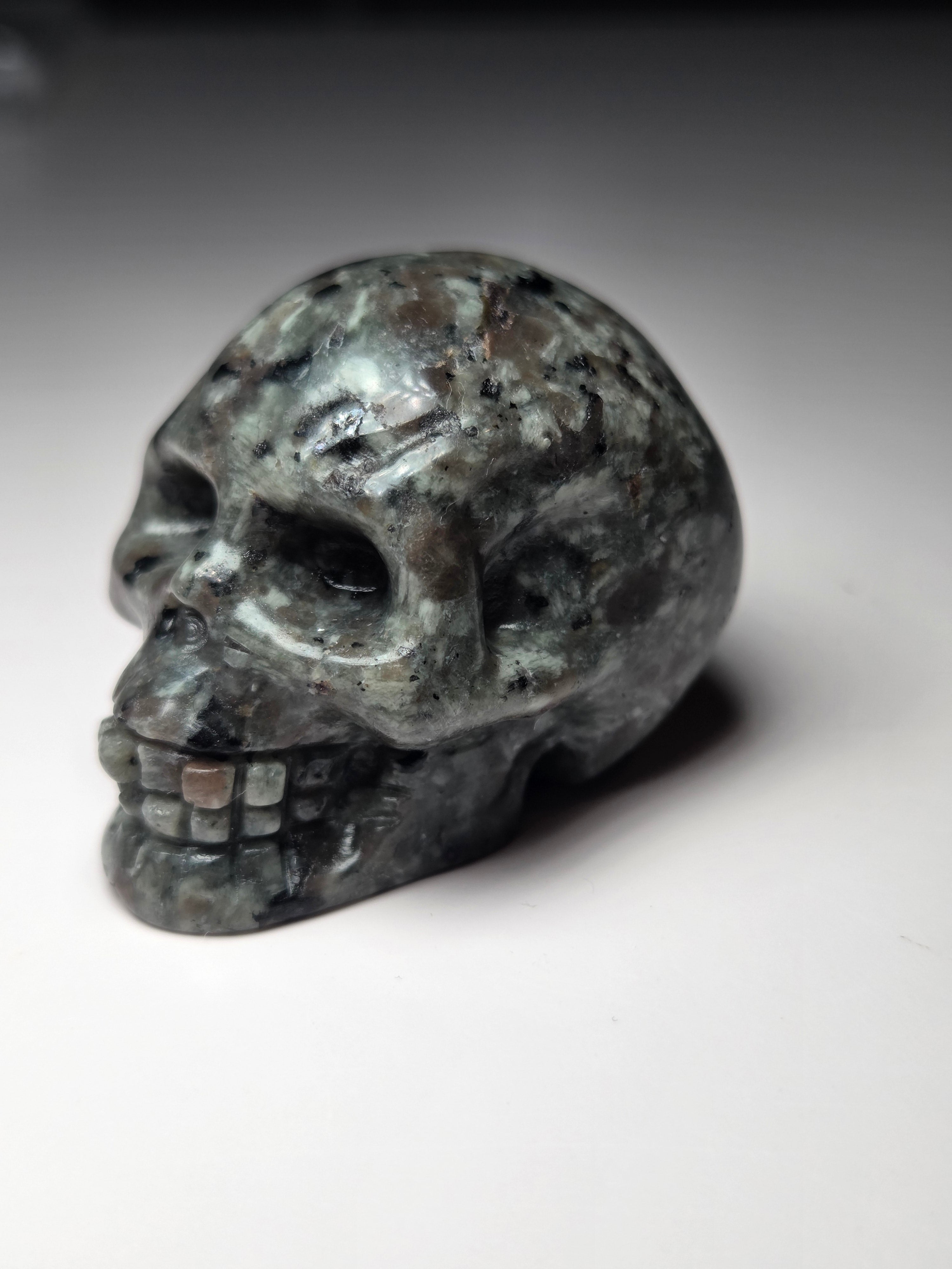 Small Yooperlite crystal skull carving