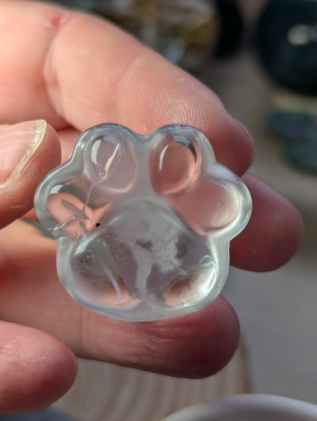 Clear quartz crystal paw print
