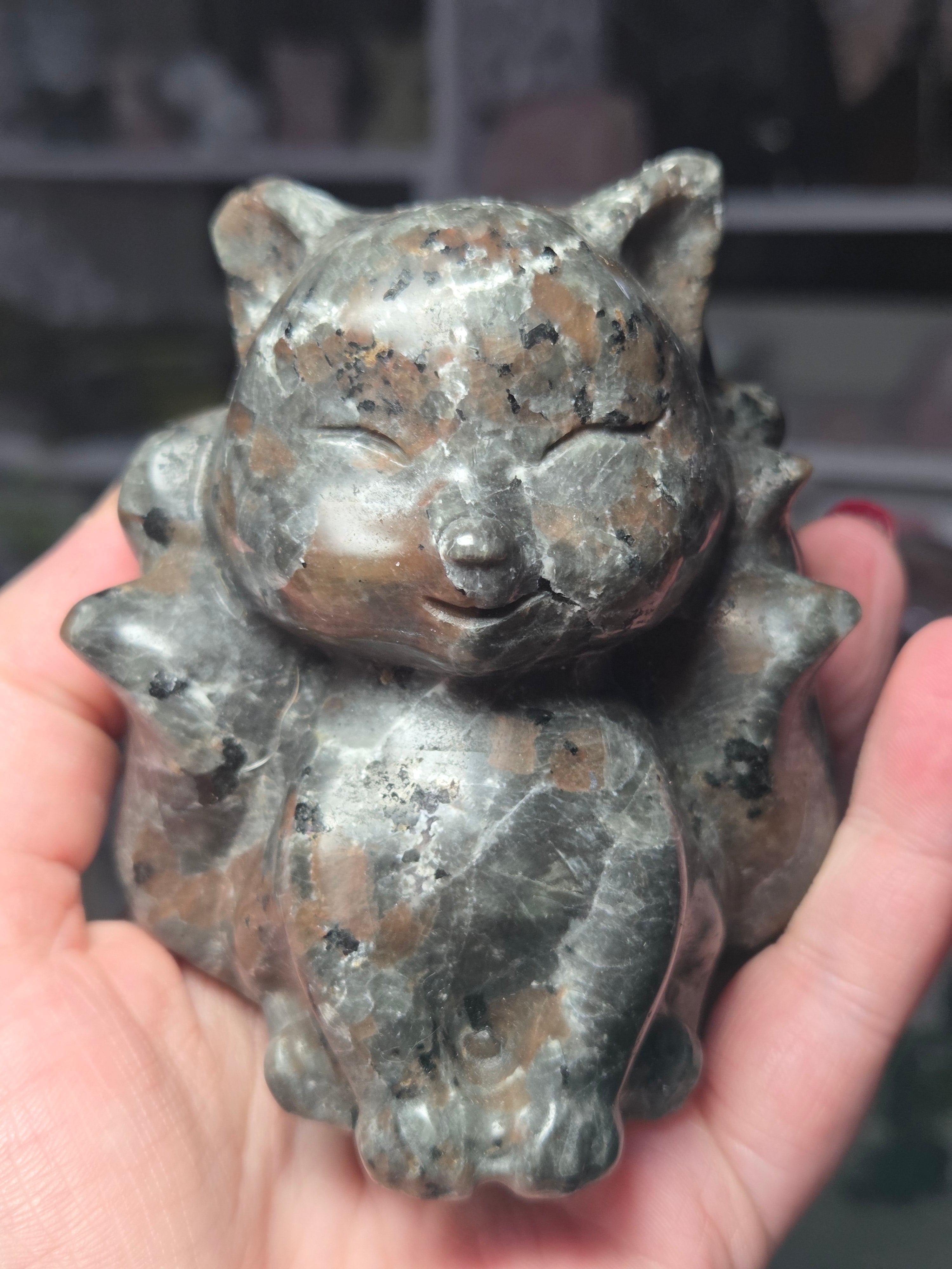 Large Yooperlite crystal 9 tail fox carving