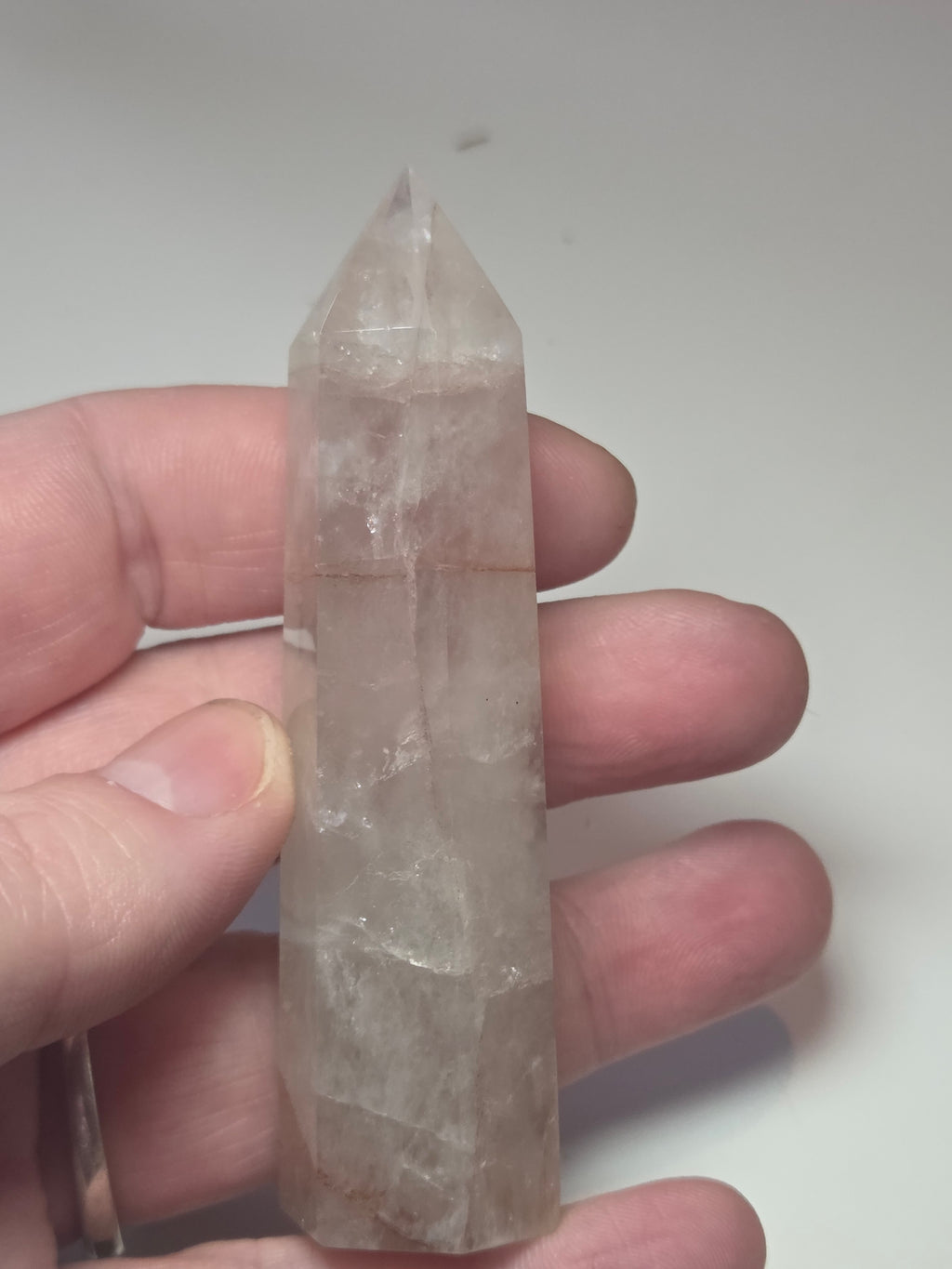 Fire quartz crystal tower carving with imperfections