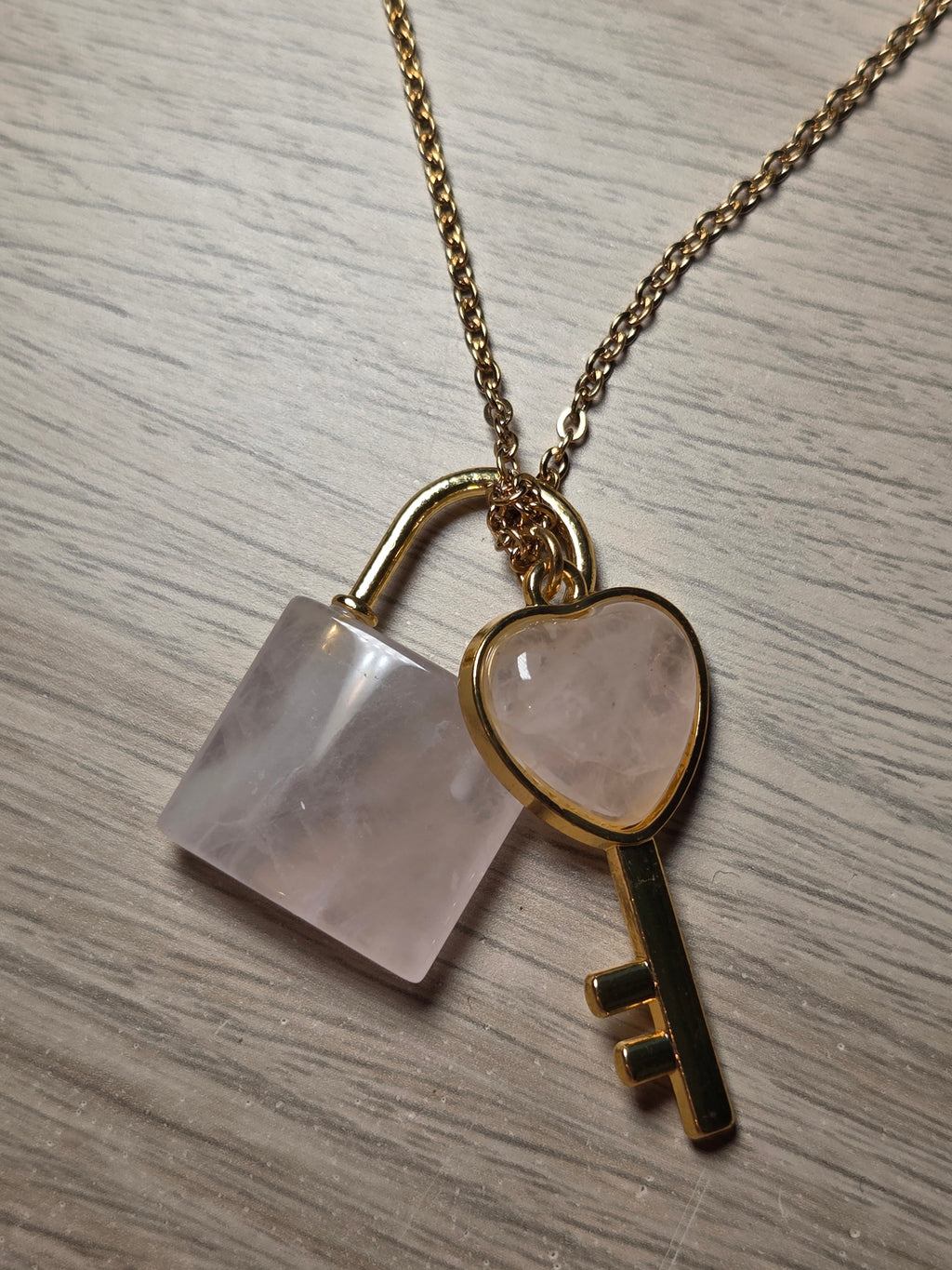 Rose quartz crystal key and log necklace