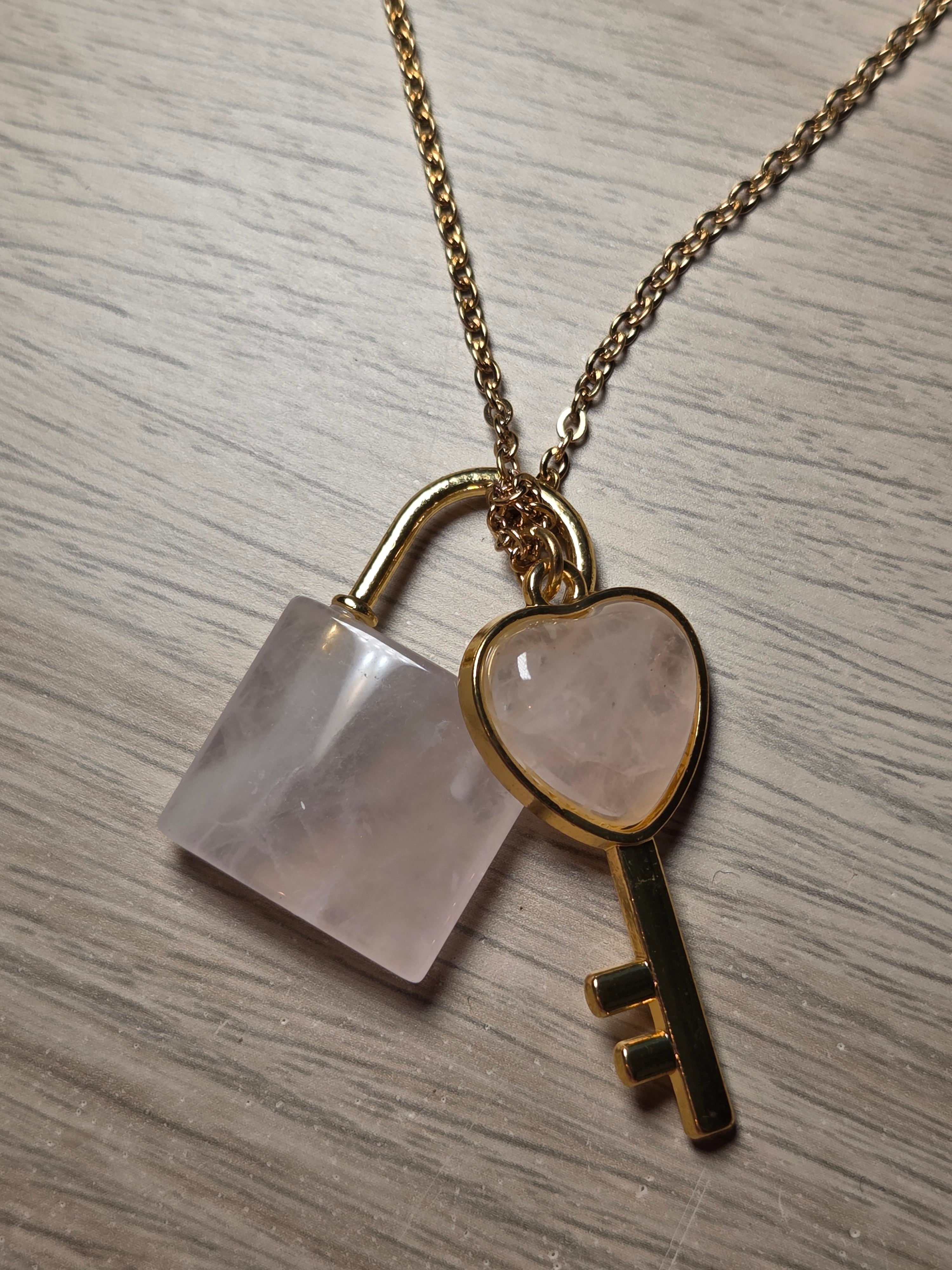 Rose quartz crystal key and log necklace