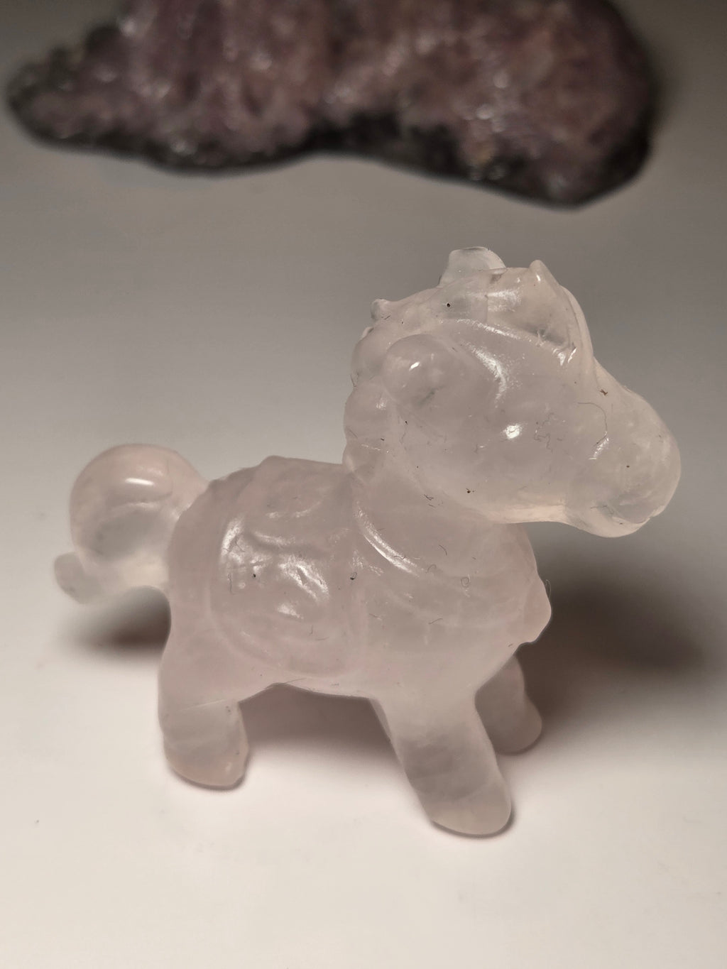 Rose quartz crystal horse carving
