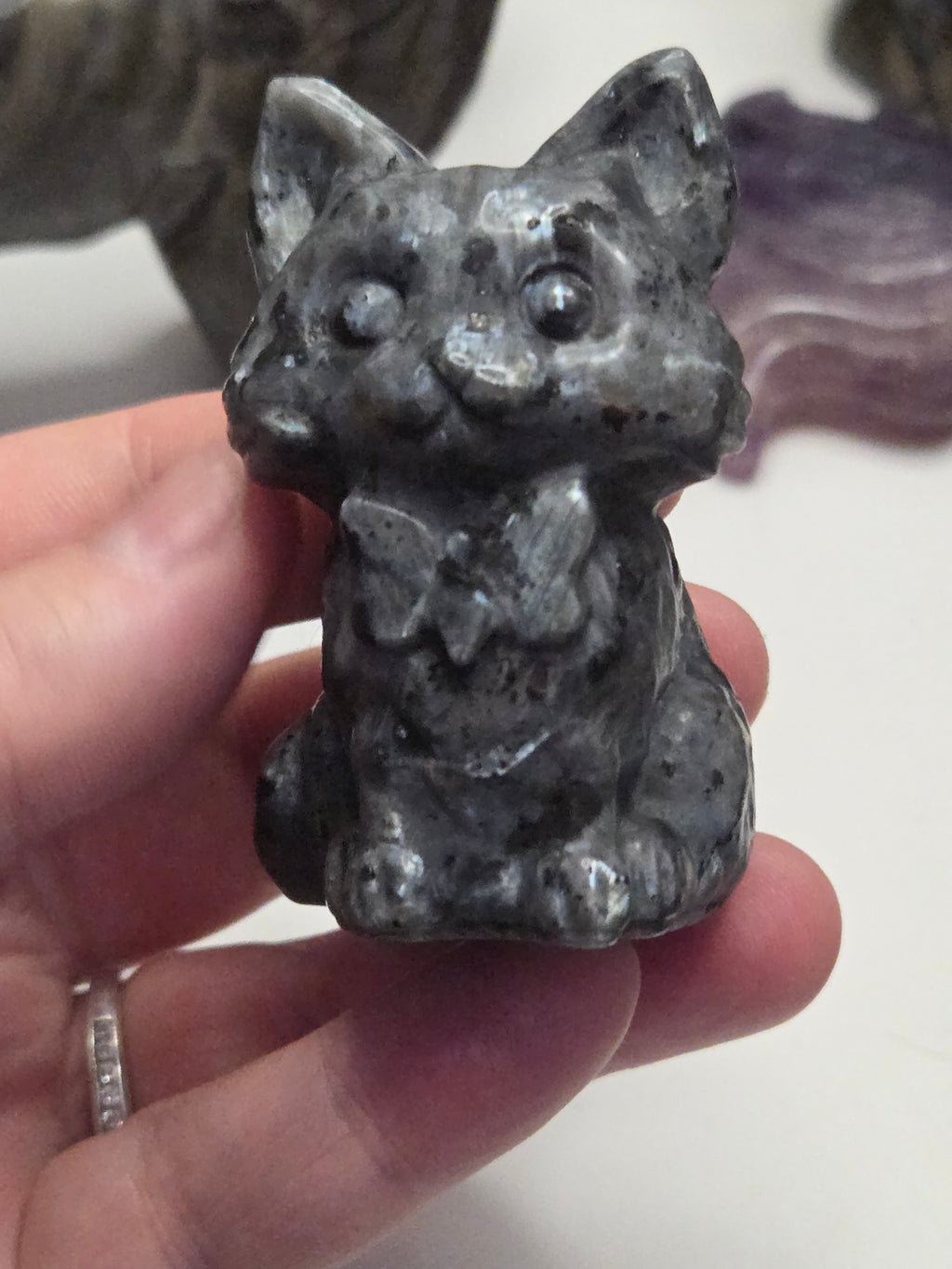 Larvakite crystal cat with  bow carving