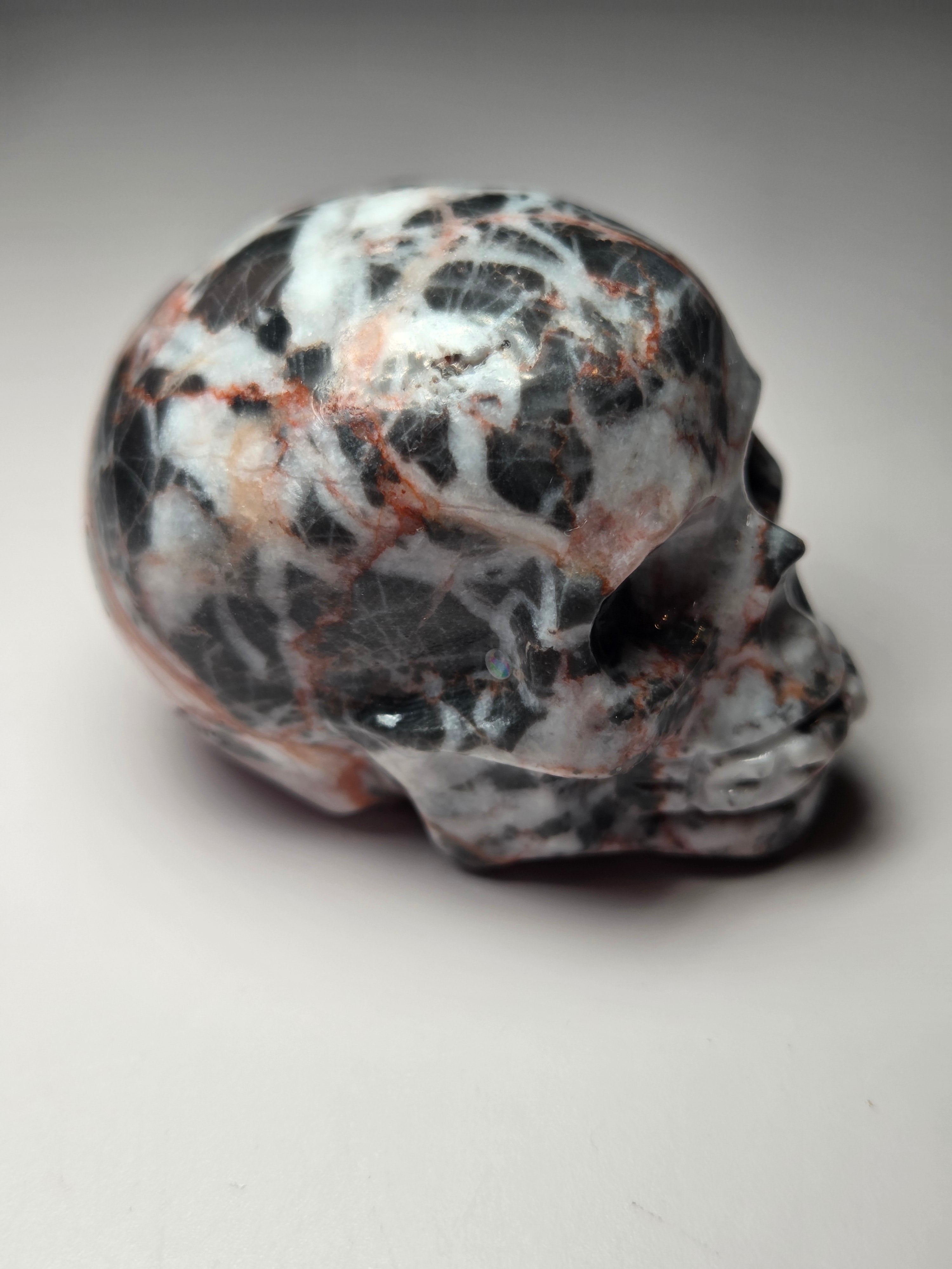 Red vain jasper crystal skull