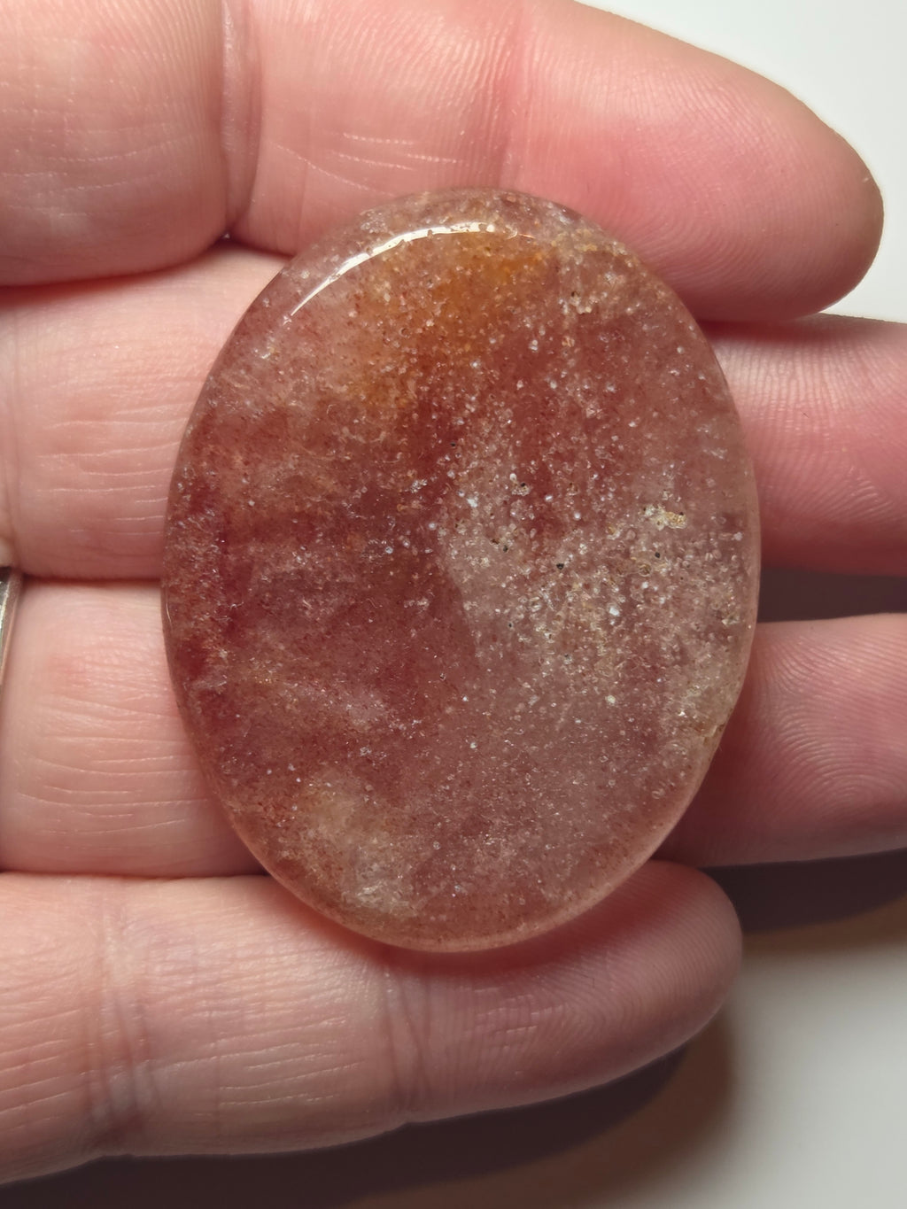 Strawberry quartz crystal worry stone