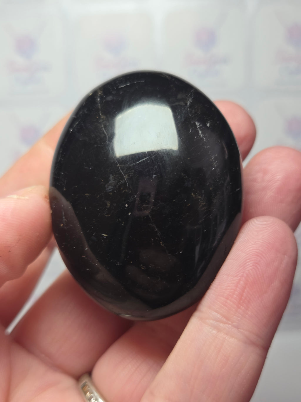 Tourmaline crystal palm stone
