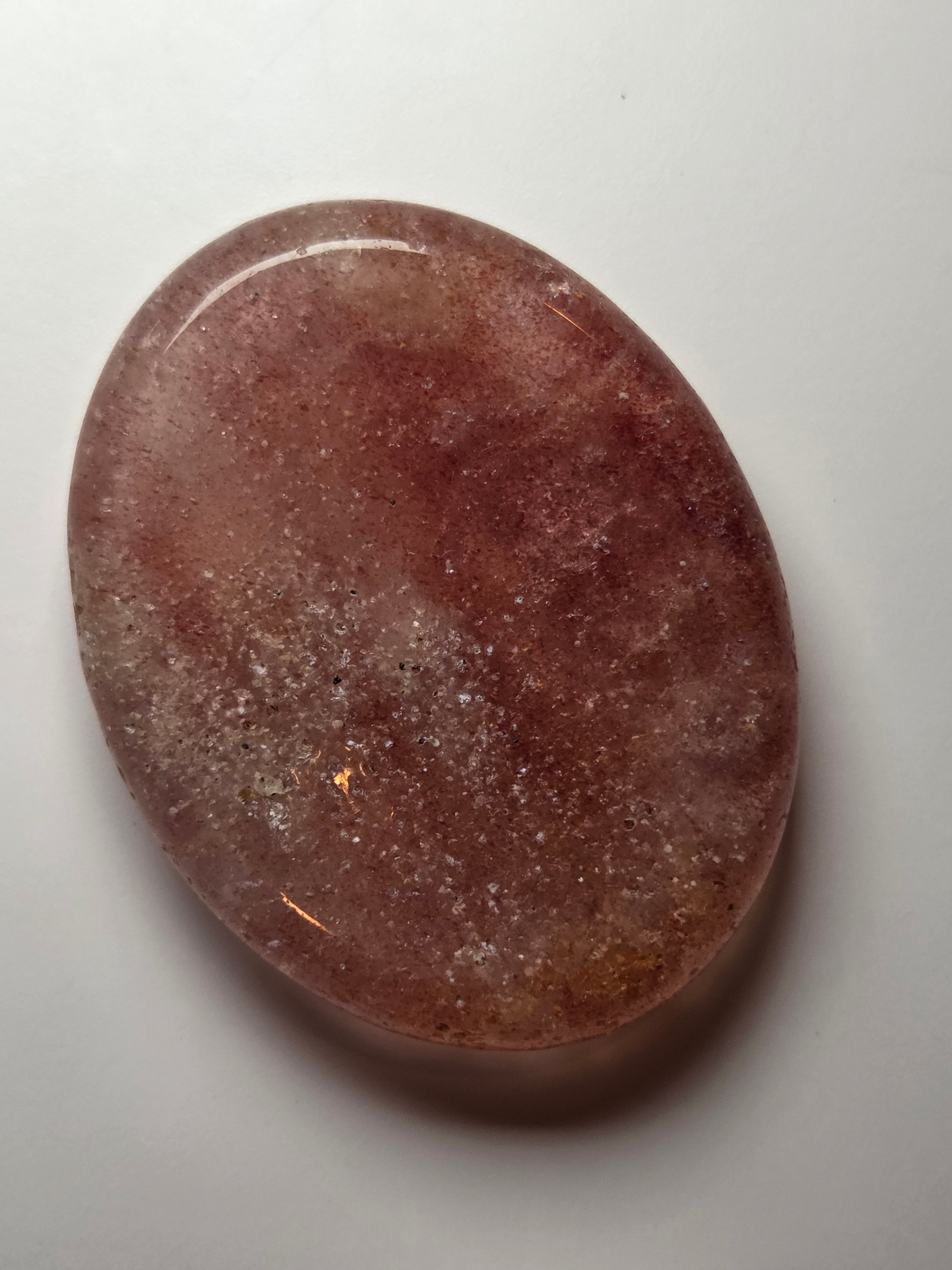 Strawberry quartz crystal worry stone