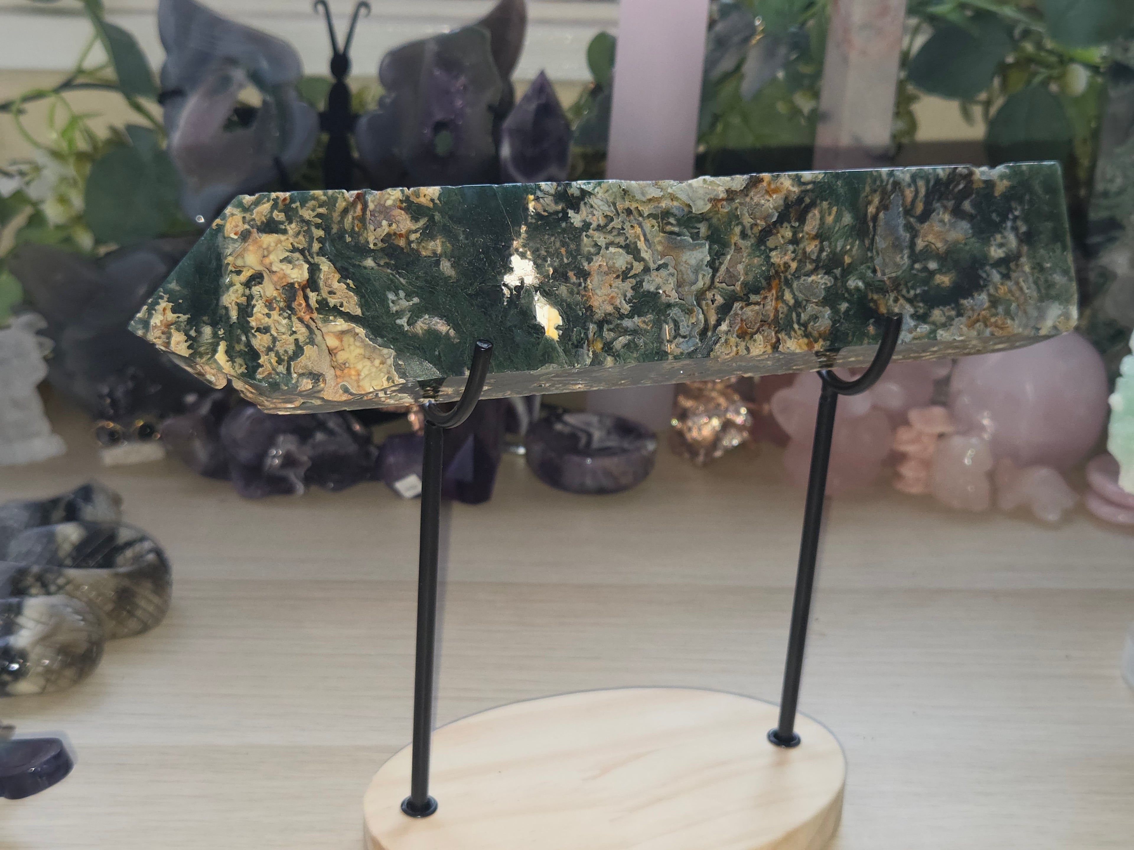 Large Crystal moss agate tower with imperfections as does not stand alone comes with stand