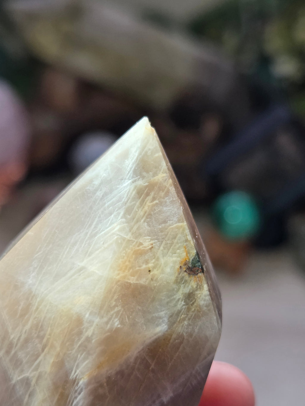 Rainbow moonstone and sunstone crystal wand carving with stand