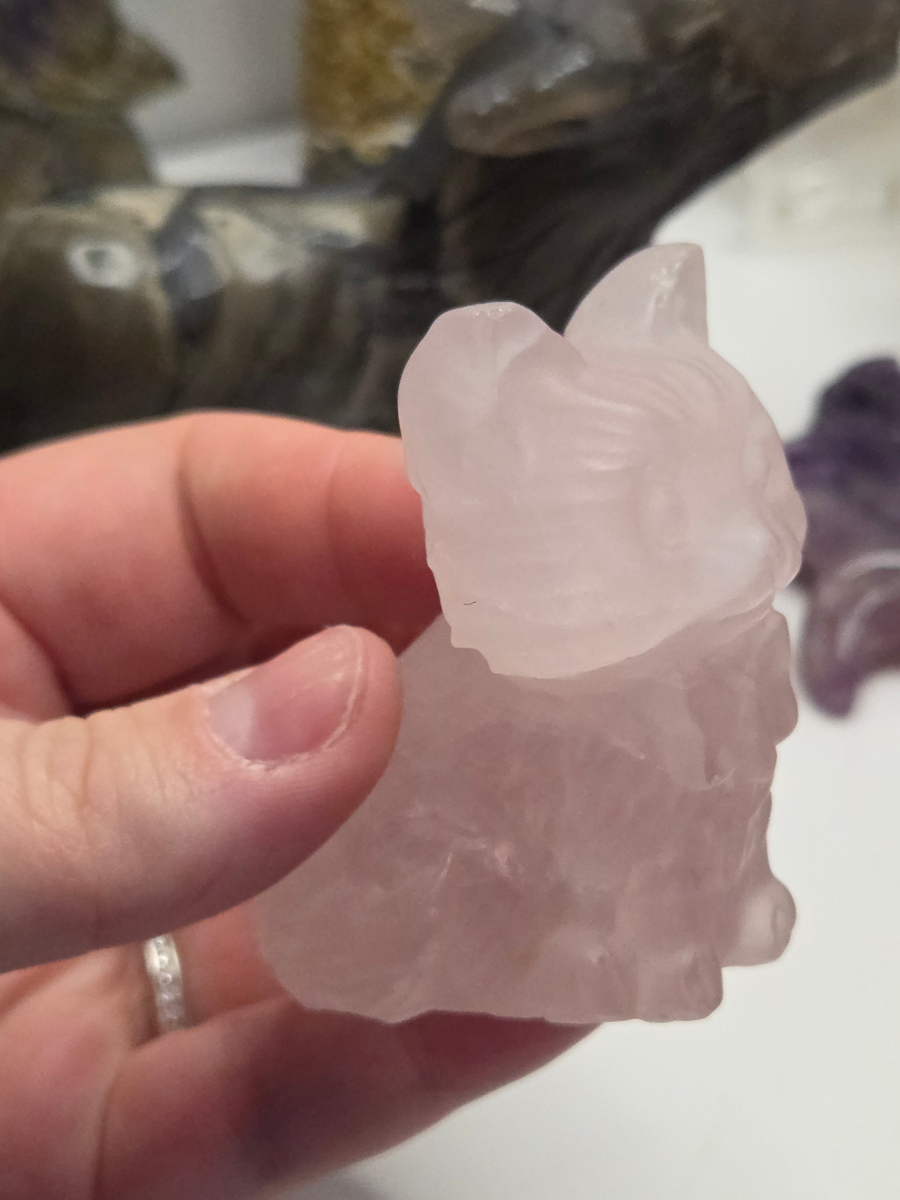 Rose quartz crystal cat carving