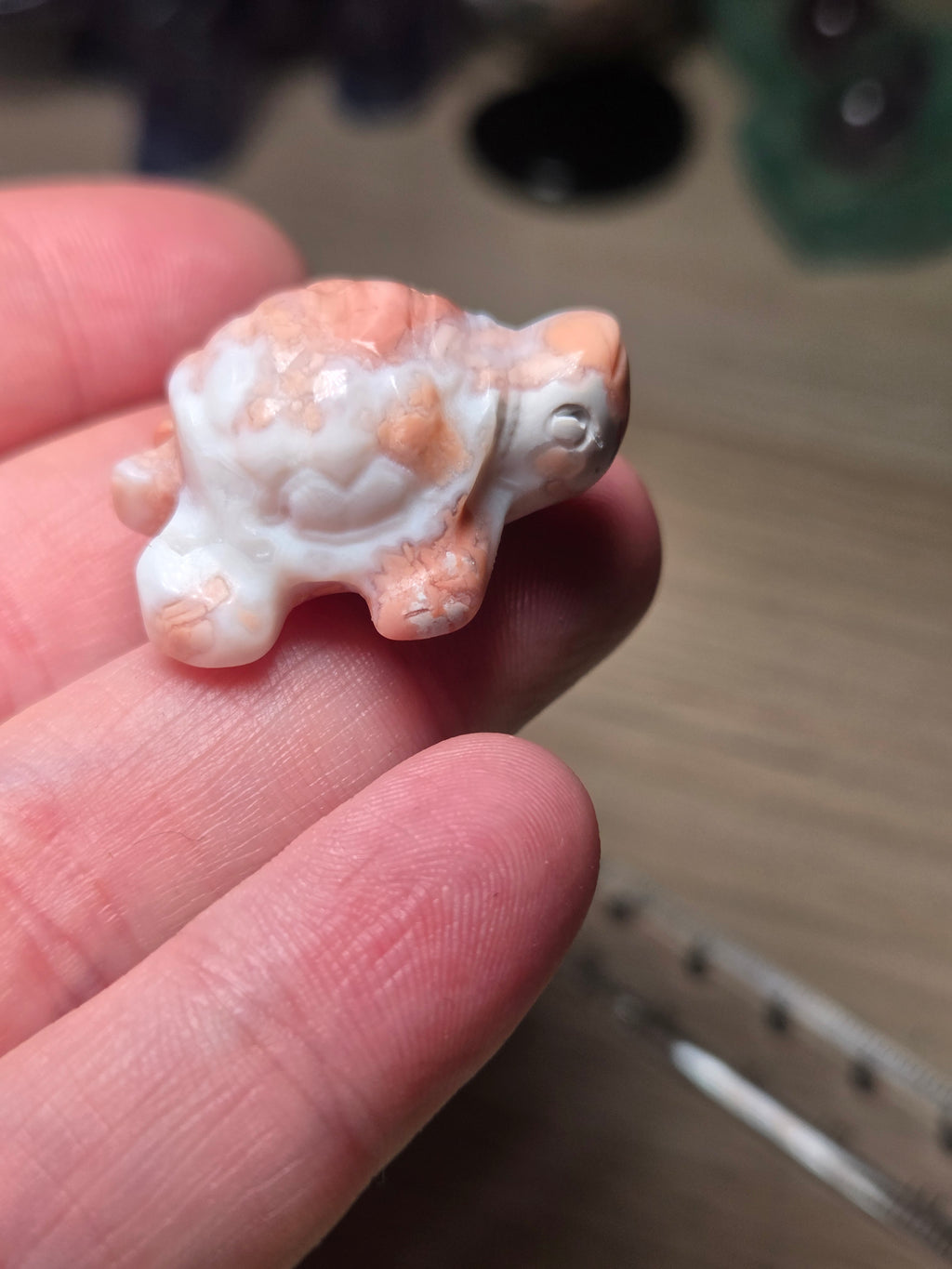 Cotton candy pink turtle carving